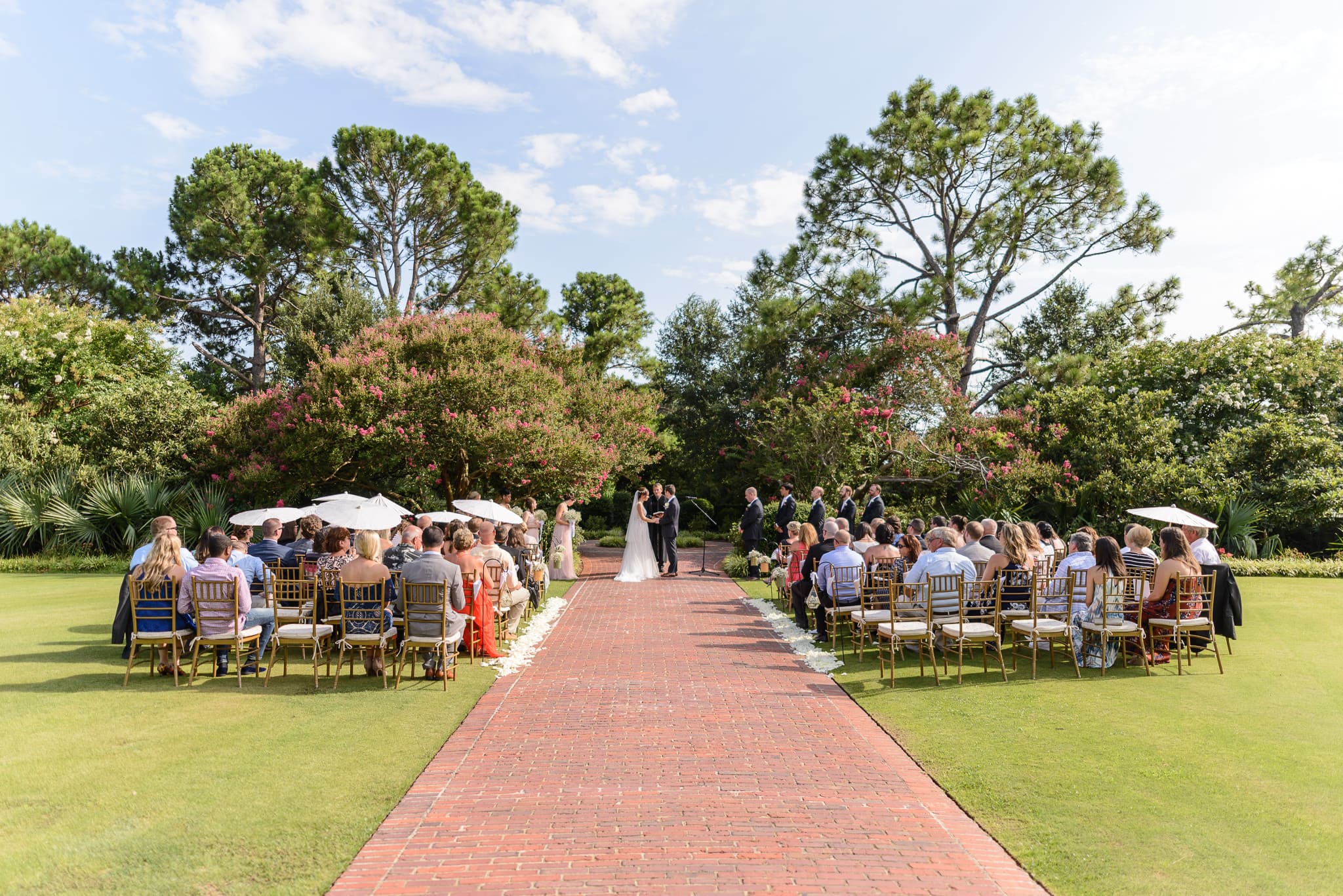 Wide angle pictures of wedding ceremony Pine Lakes Country Club