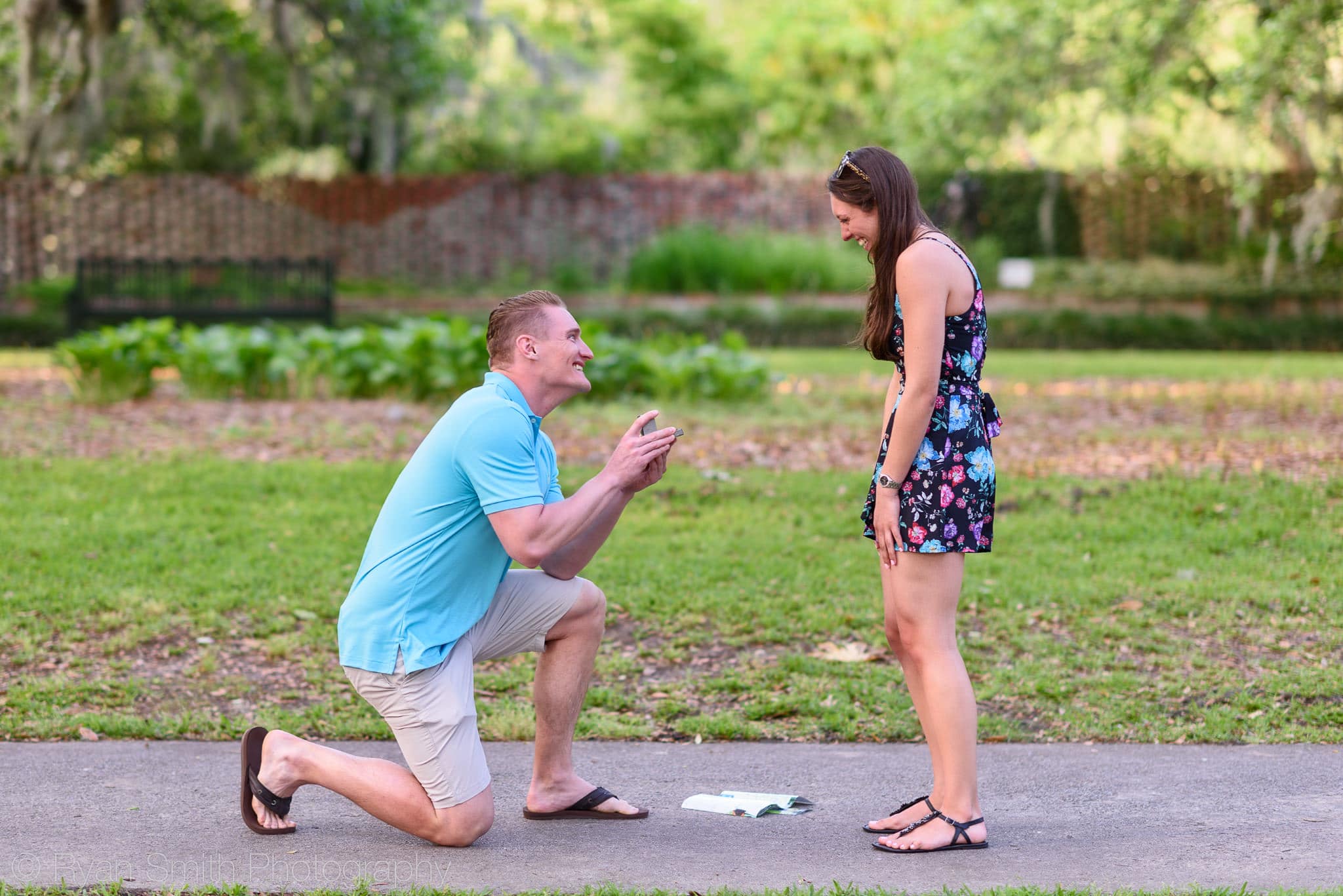 Down on one knee showing the ring - Brookgreen Gardens