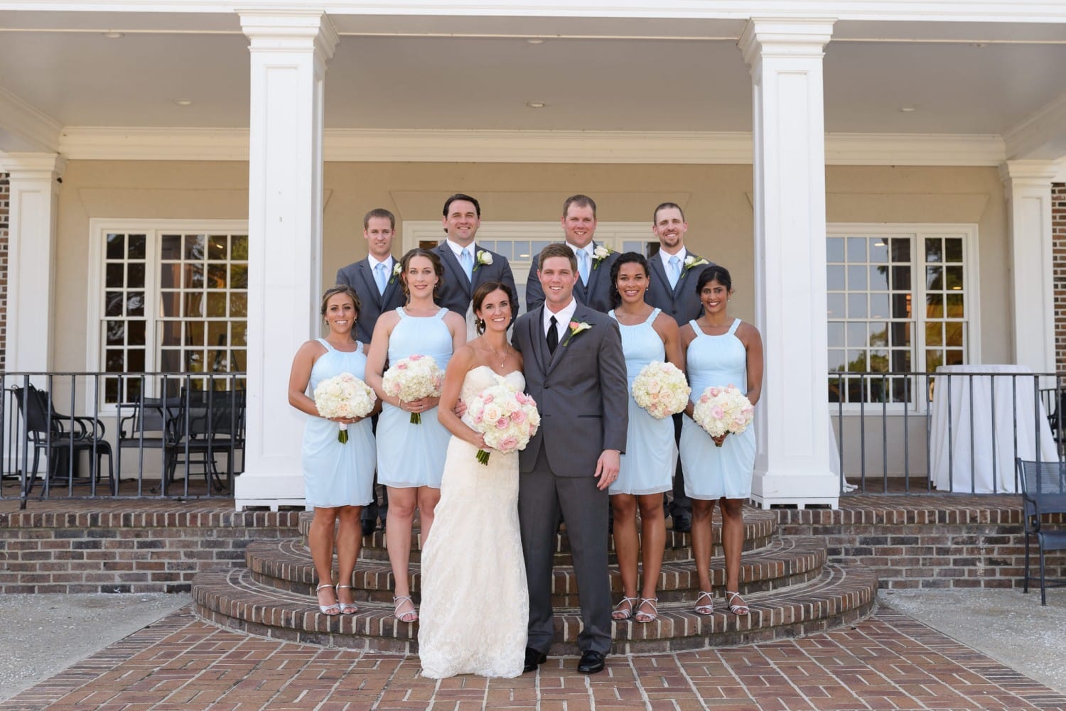 Bridal party standing on back steps - Pawleys Plantation