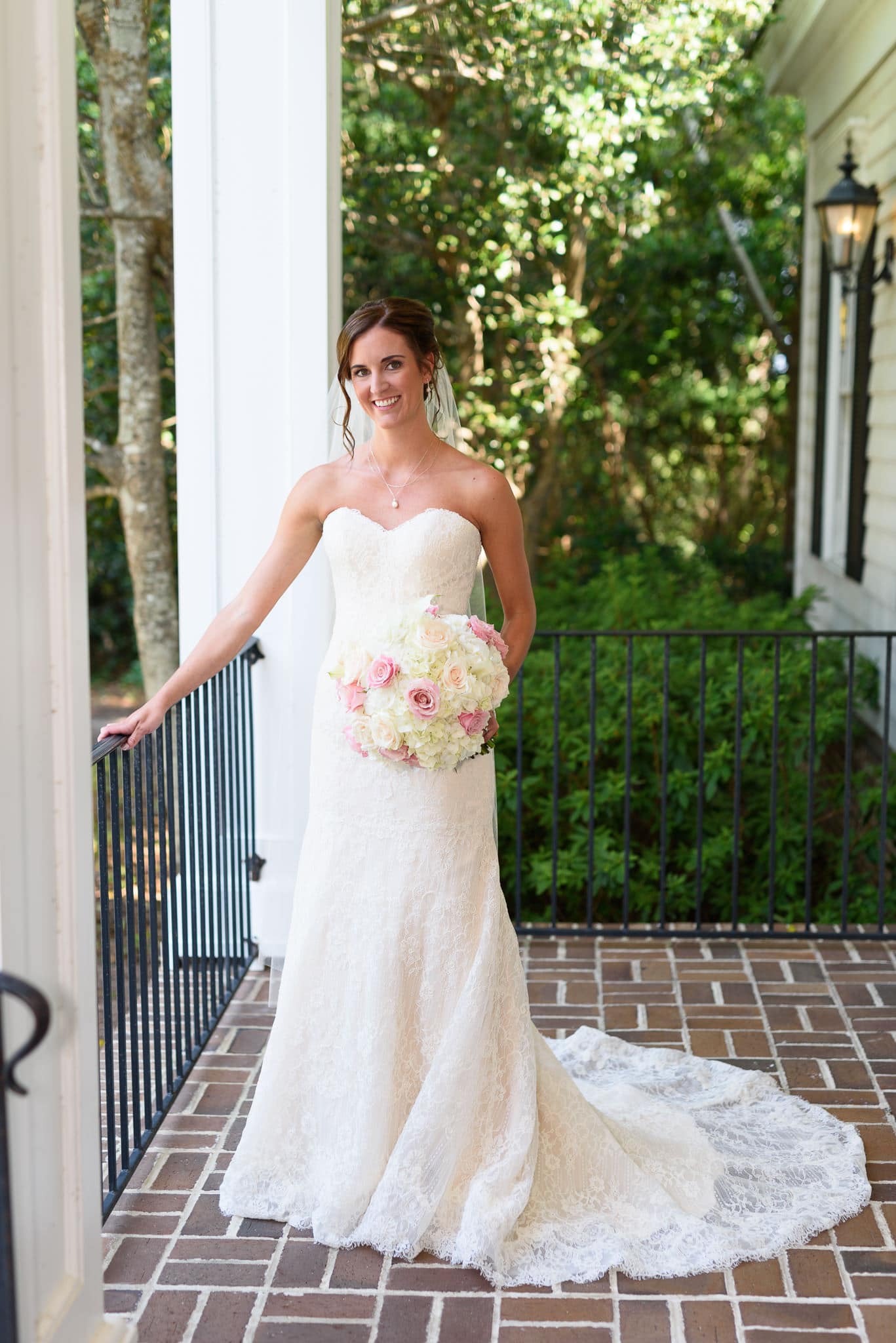 Bride with her dress flowing to the side - Pawleys Plantation
