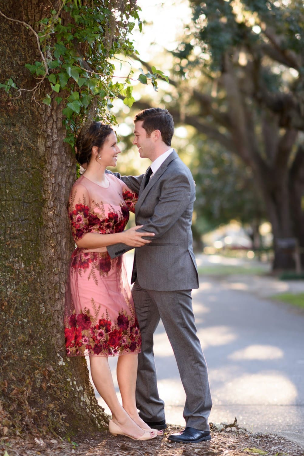 Couple leaning against the oak tree - Oak Street, Conway, SC