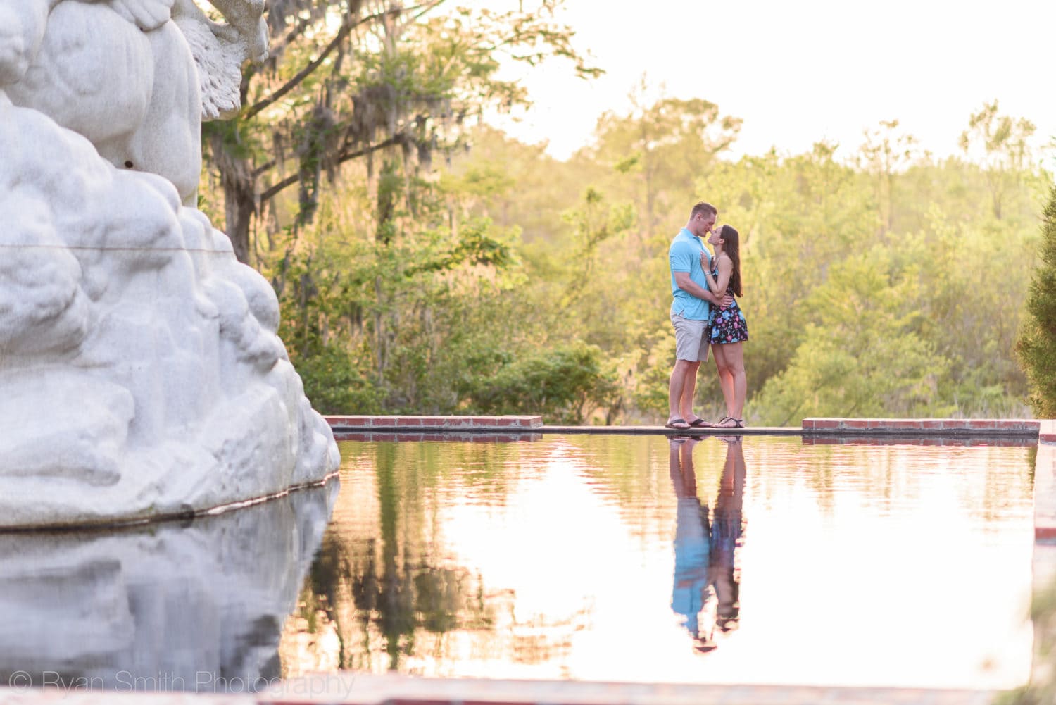 Couple reflecting in the water - Brookgreen Gardens