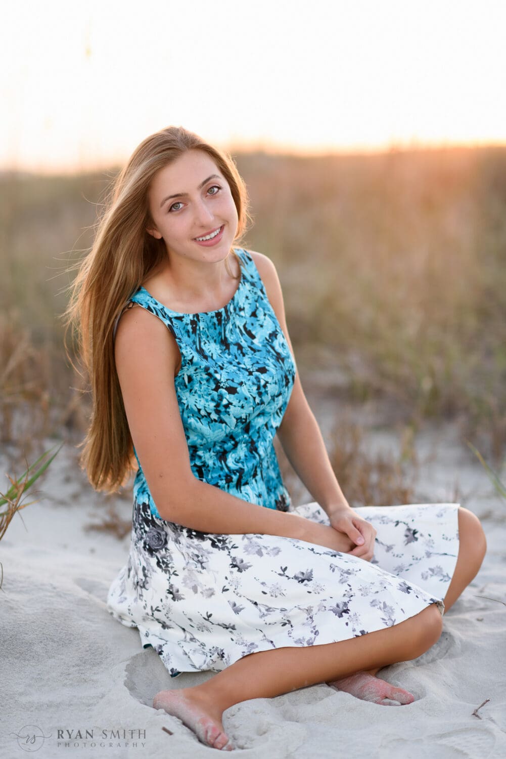 Senior portraits in the sunset by the dunes - Huntington Beach State Park