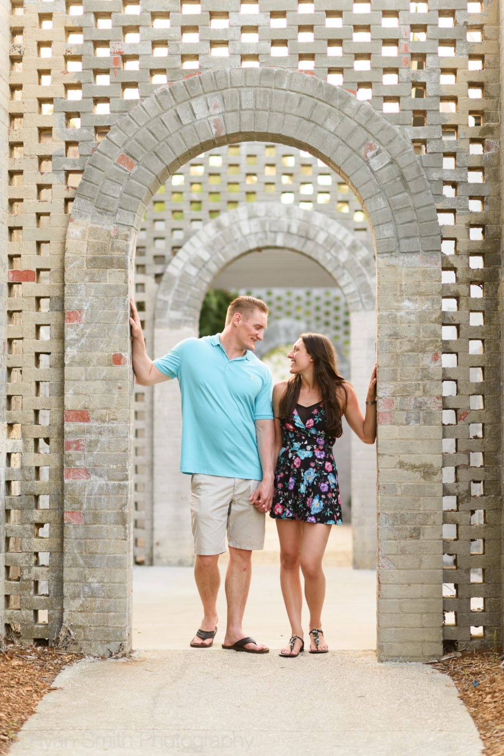 Smiling at each other in the Sculpture Center archway - Brookgreen Gardens