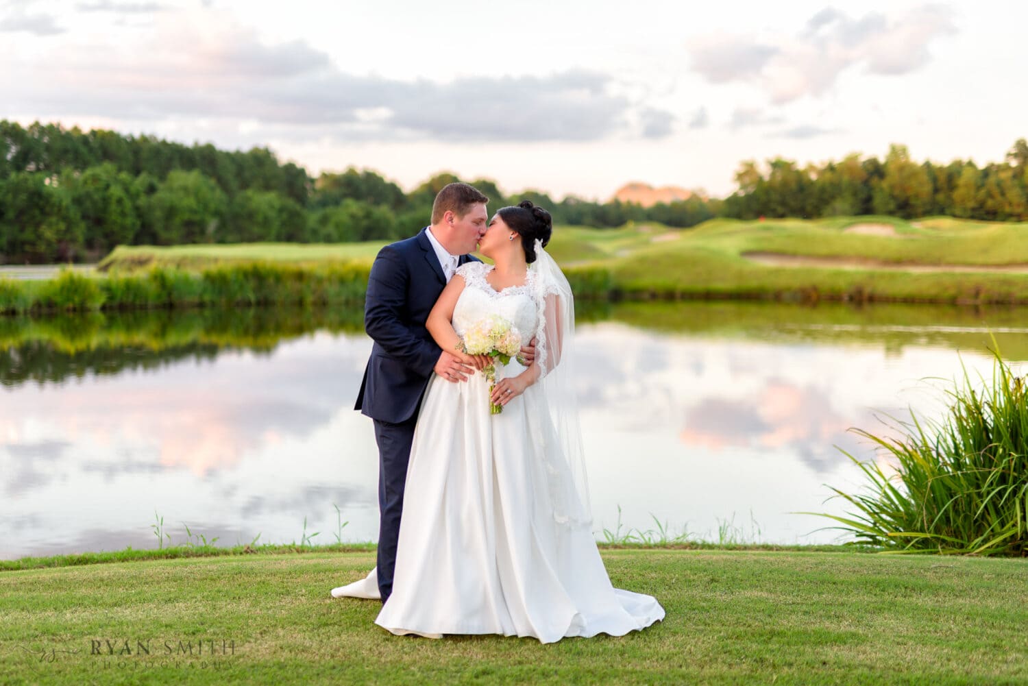 Wedding portrait in front of golf course - Dye Club at Barefoot Resort