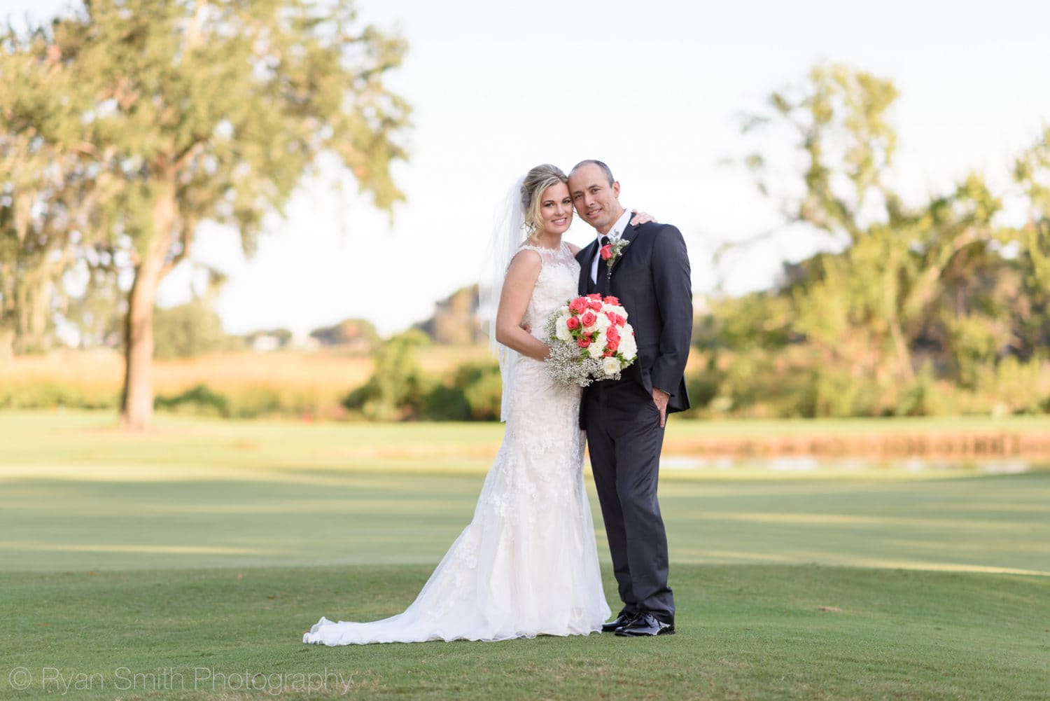 Bride and groom on the golf course - Pawleys Plantation