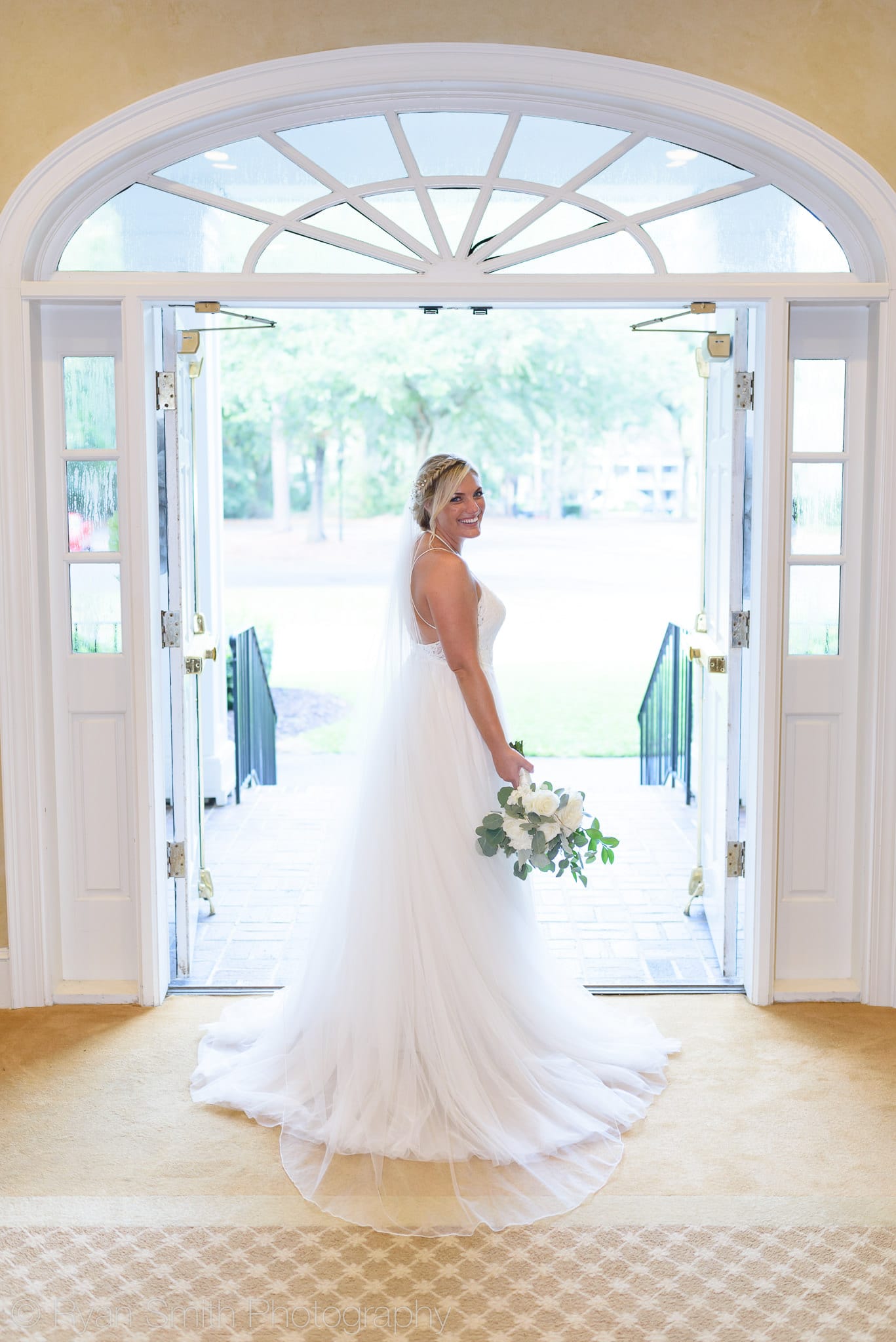 Bride standing in the doorway - Pawleys Plantation
