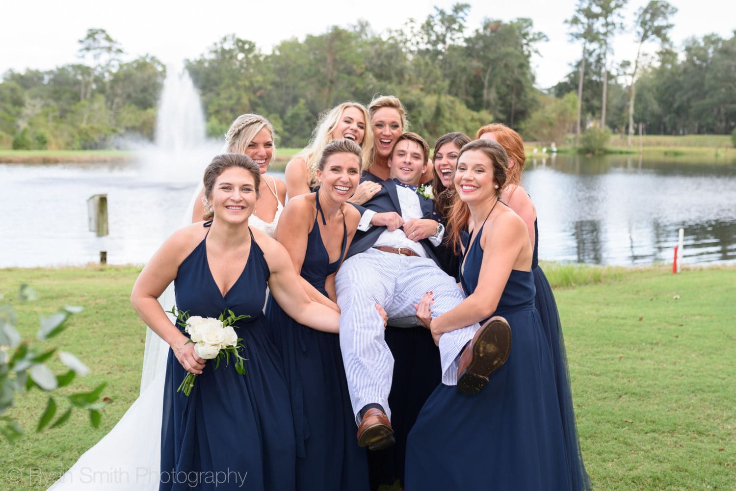 Groom being picked up by bridesmaids - Pawleys Plantation