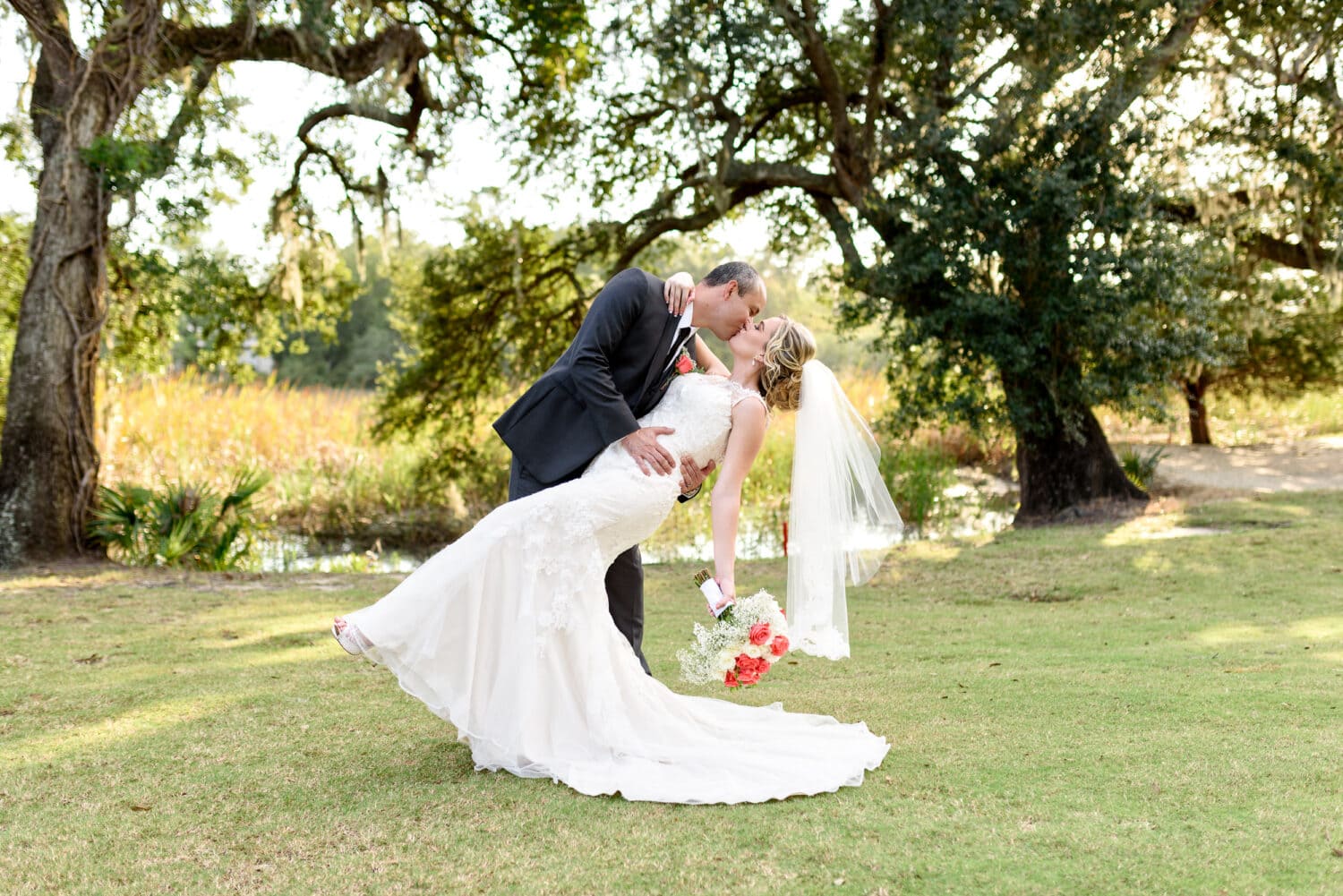 Kiss under the Oak Trees on the golf course 35mm f/2 - Pawleys Plantation Golf & Country Club