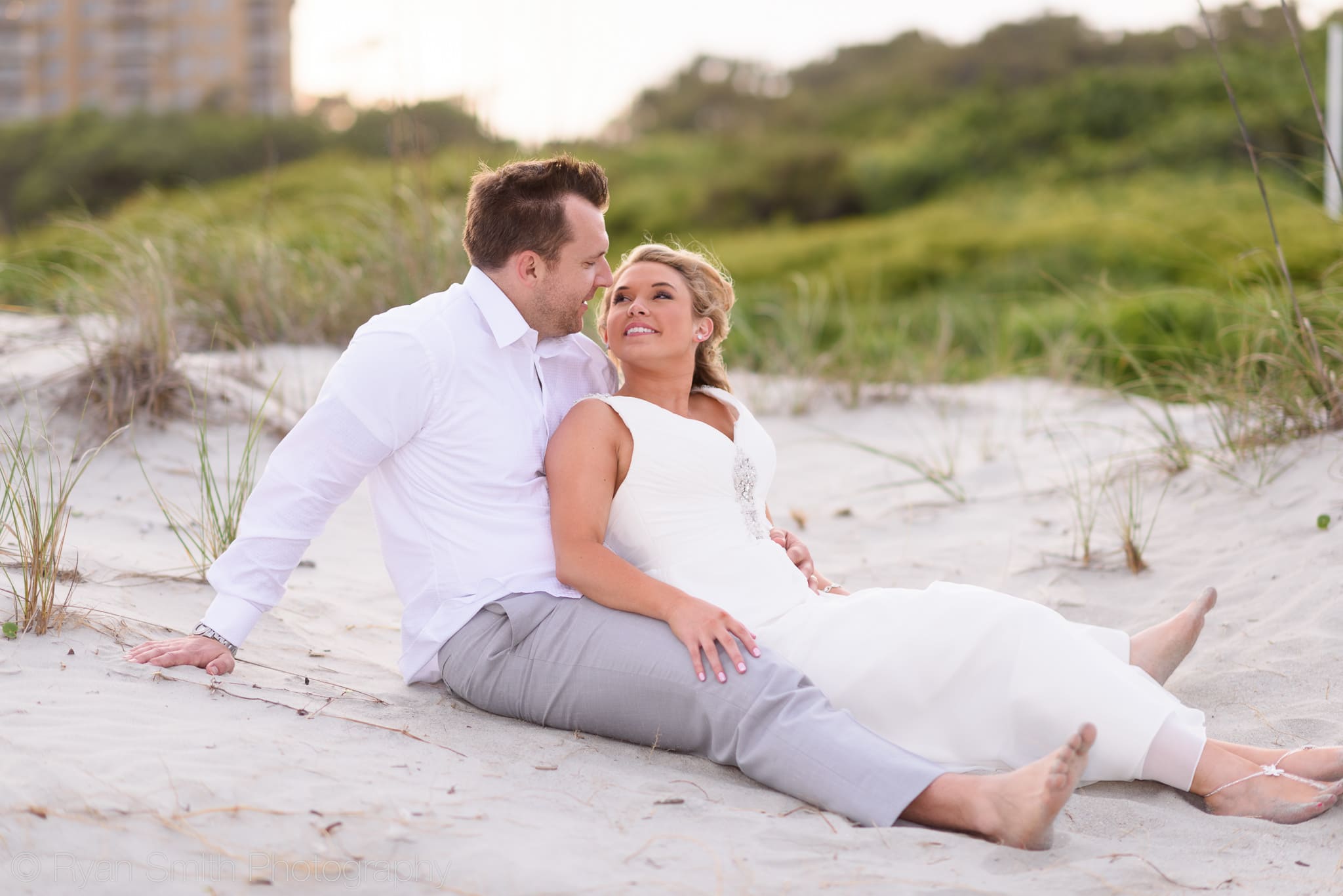 After wedding portraits by the dunes on the beach - Grande Dunes Ocean Club