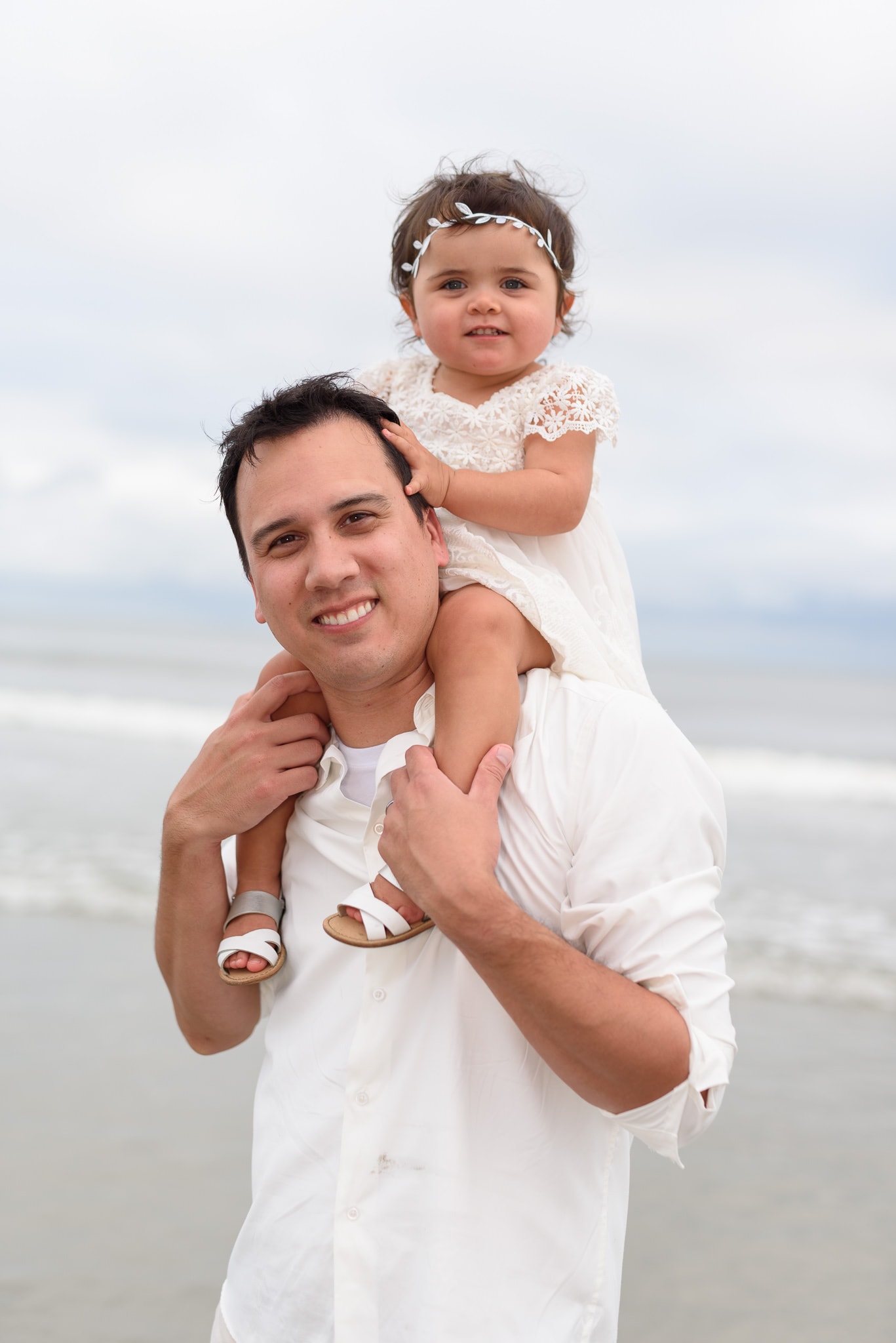 Baby girl on dad's shoulders  - North Beach Plantation