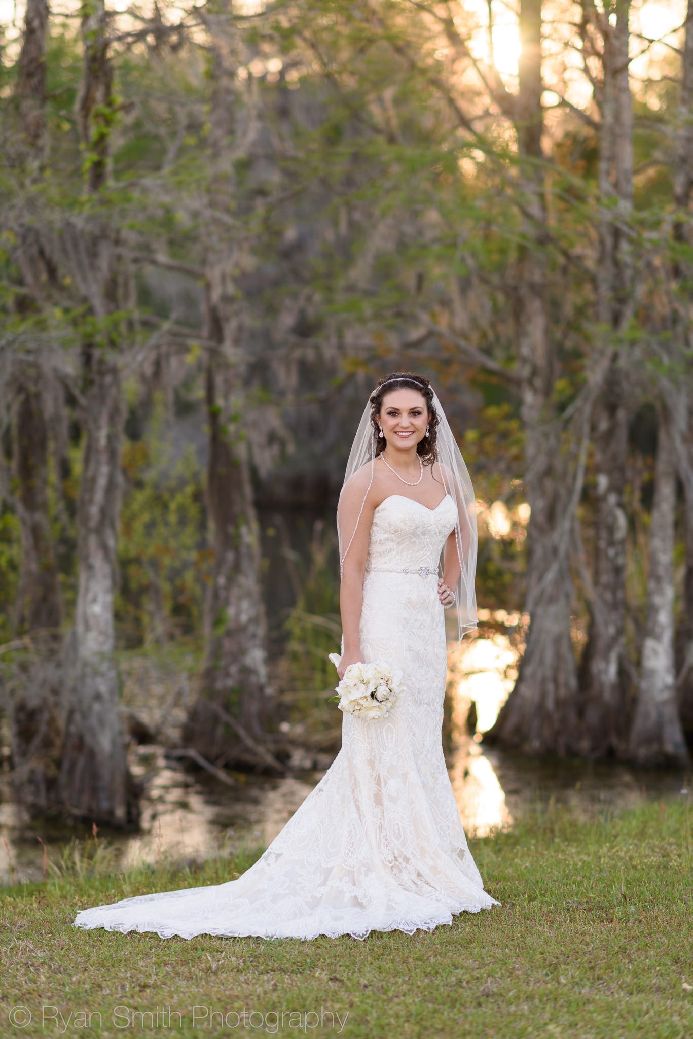 Bridal portrait with sunset reflecting in the lake - Upper Mill Plantation