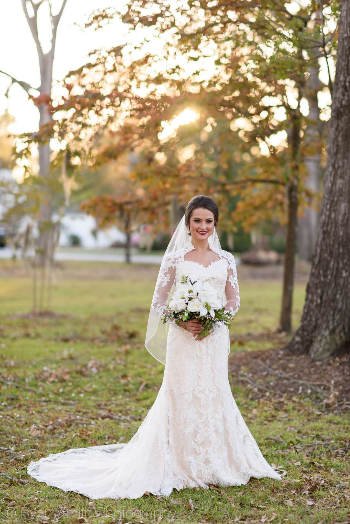 Bridal portraits backlit by sunlight coming through the trees - Rosewood Manor, Marion