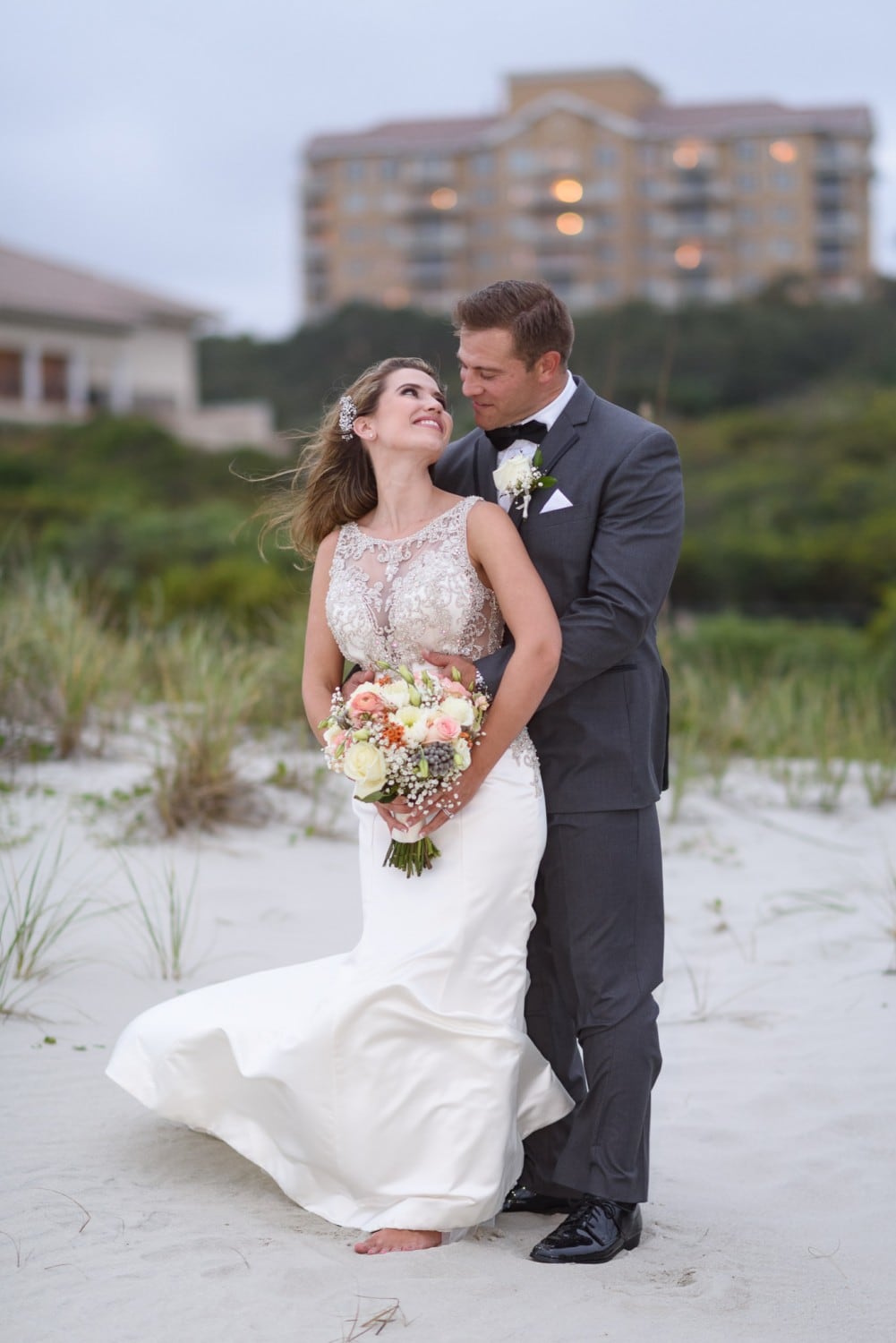 Bride and groom by the dunes - Grande Dunes Ocean Club - Myrtle Beach