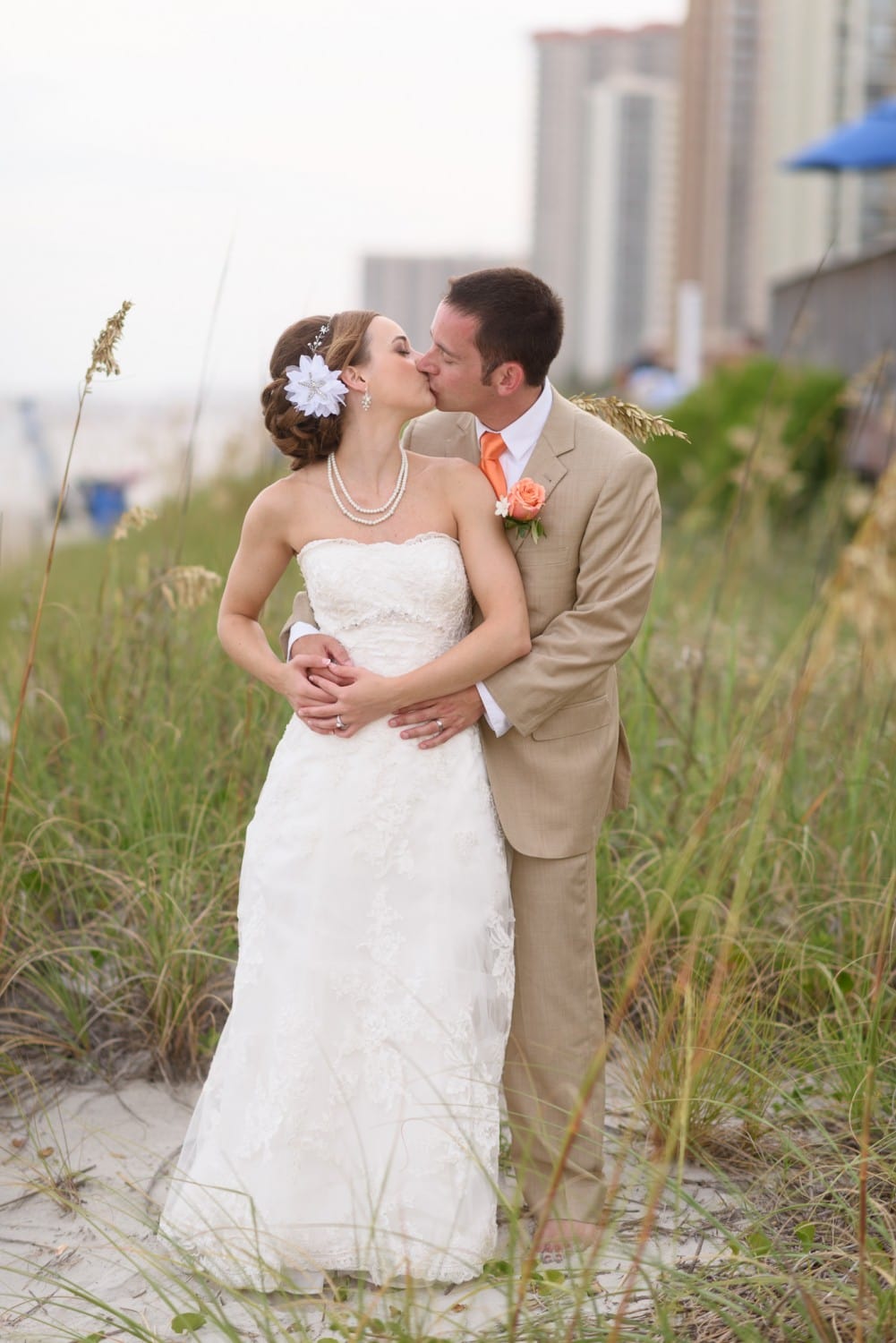 Bride and groom prom pose in the sea oats - Hilton at Kingston Plantation