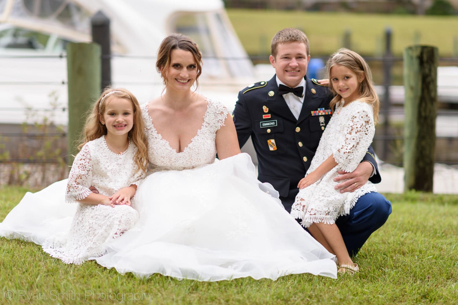 Bride and groom with daughters - Reserve Harbor Yacht Club