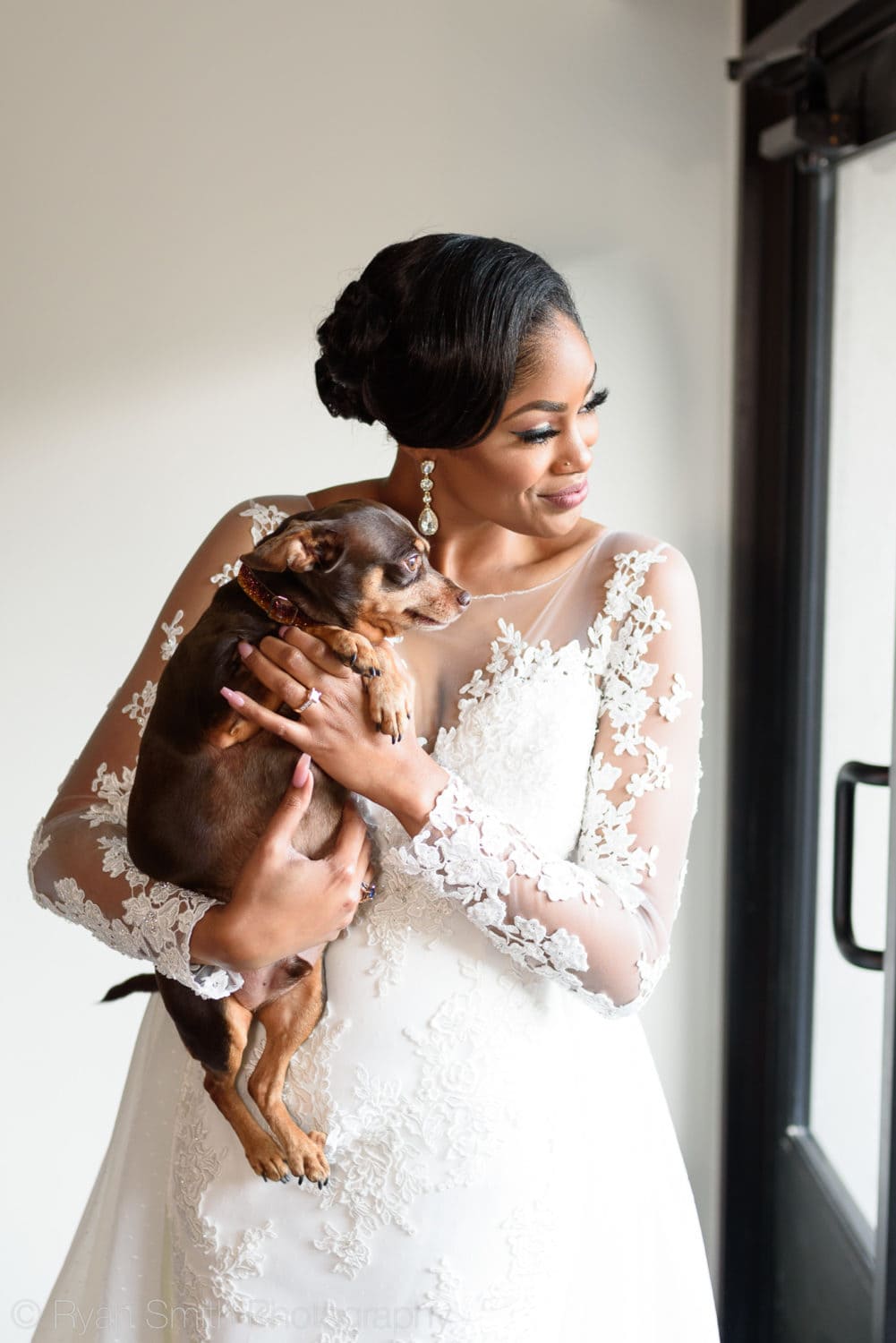 Bride and puppy looking out the window - Doubletree Resort by Hilton Myrtle Beach