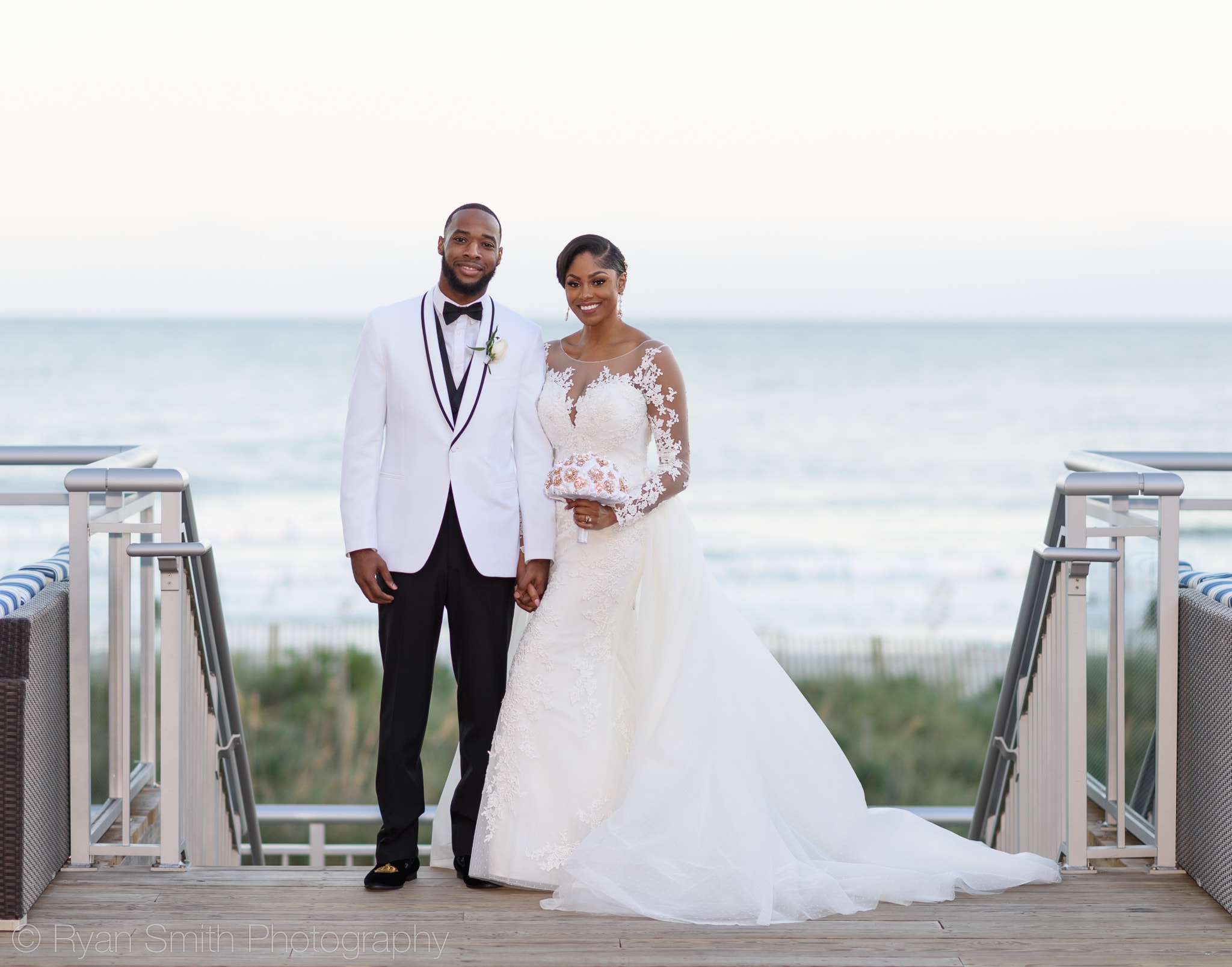 Bride and room standing on balcony - Doubletree Resort by Hilton Myrtle Beach