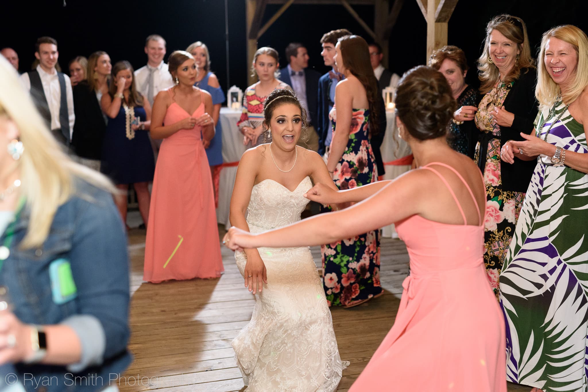 Bride dancing with her bridesmaid - Upper Mill Plantation