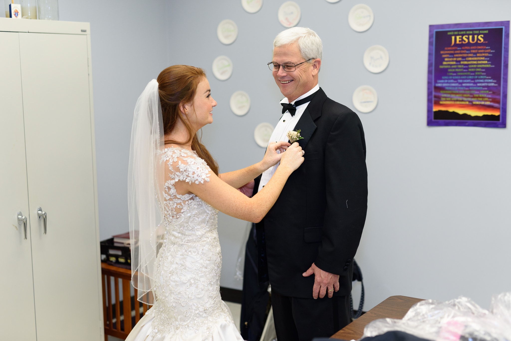 Bride helping dad with boutonniere  - Historic Church downtown Georgetown