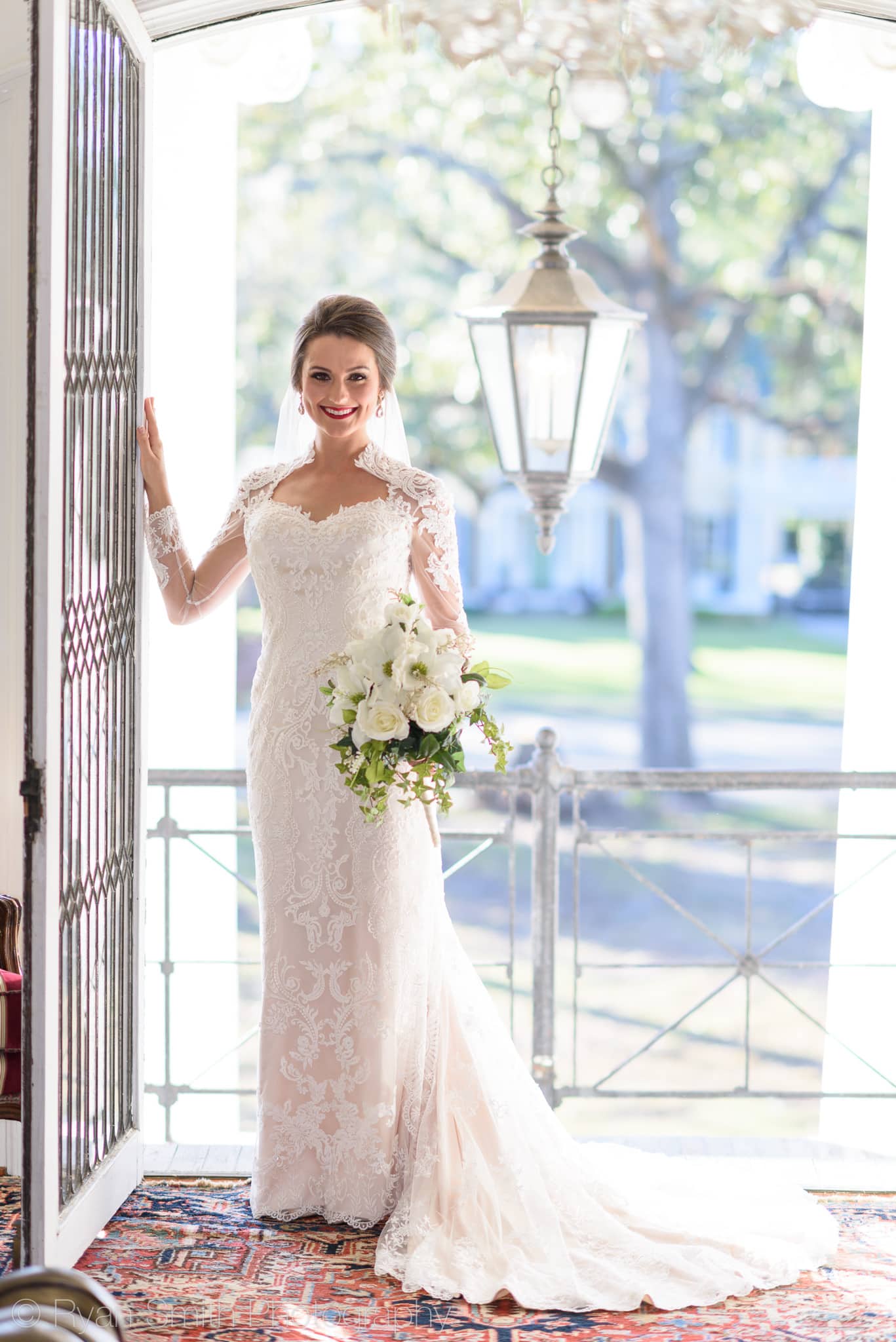 Bride leaning against balcony door - Rosewood Manor - Marion - Rosewood Manor, Marion