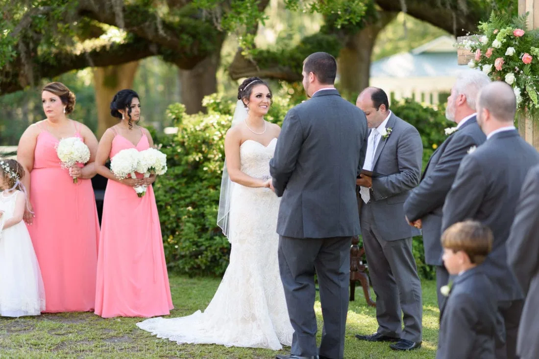 Bride looking at the groom during the ceremony - Upper Mill Plantation