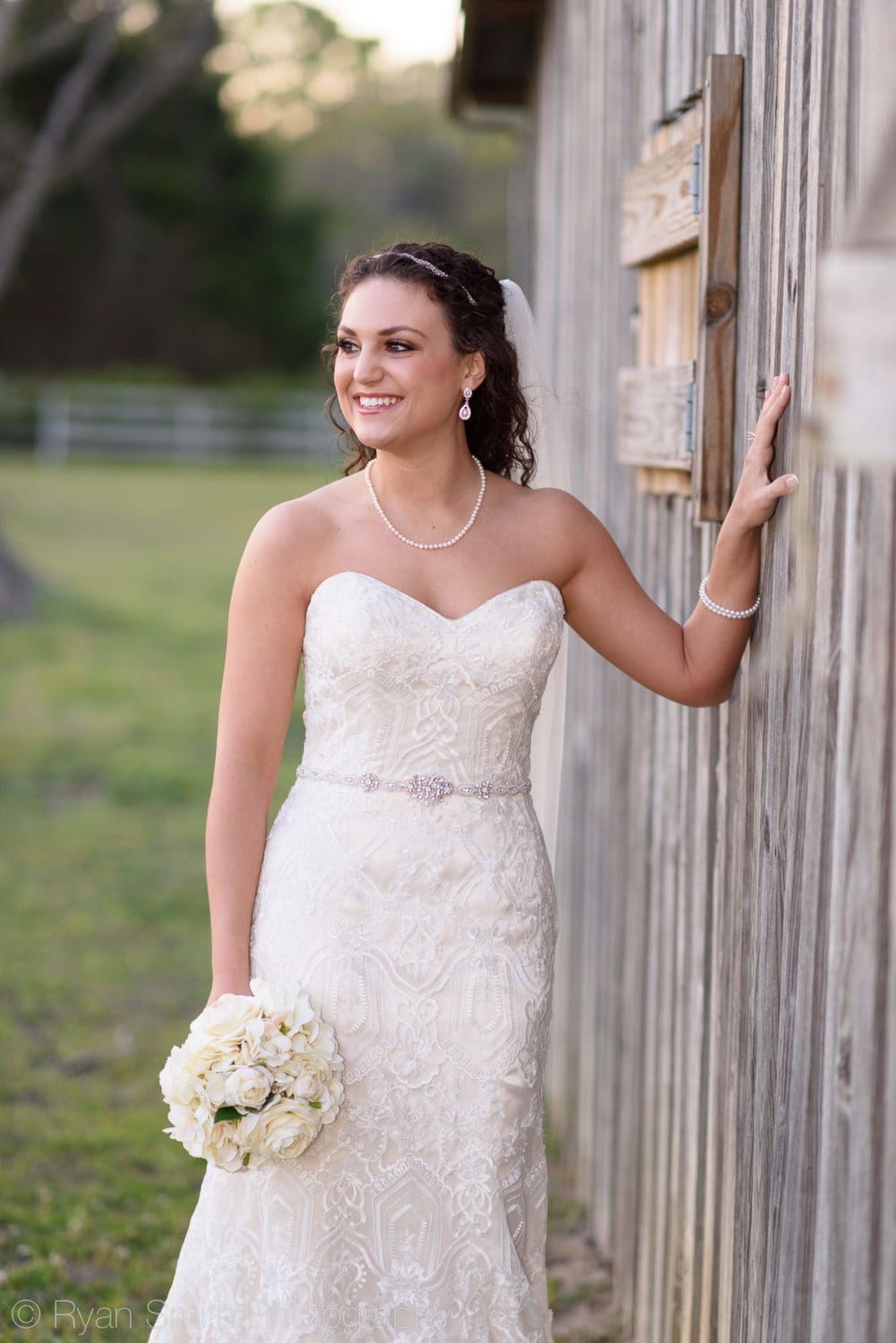 Bride looking out at the farm - Upper Mill Plantation