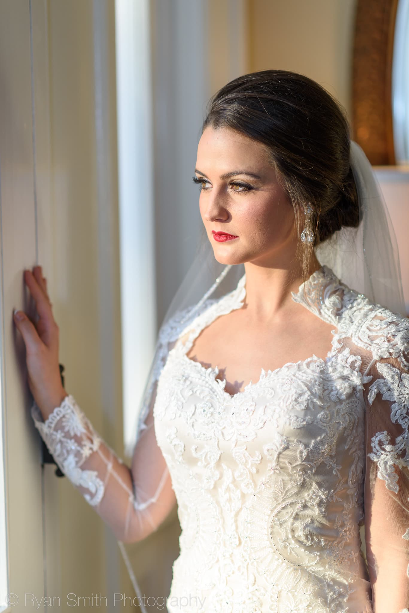 Bride looking out of a window - Rosewood Manor, Marion