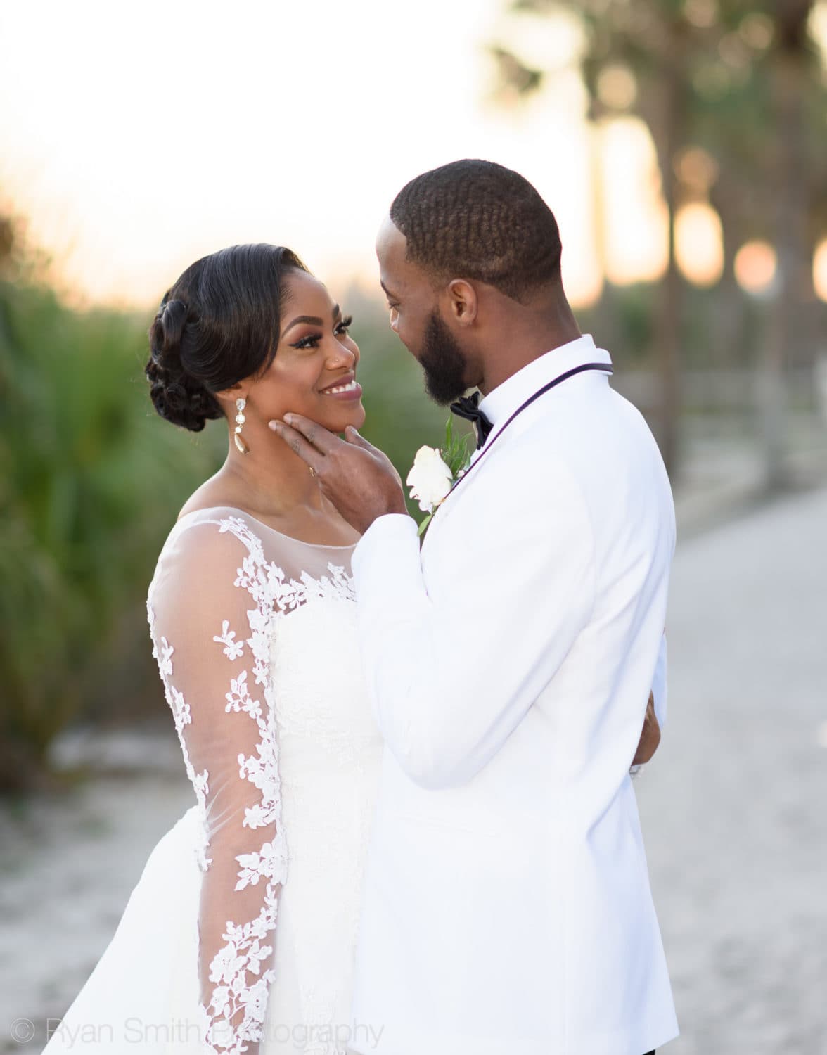 Bride smiling looking into groom's eyes - Doubletree Resort by Hilton Myrtle Beach