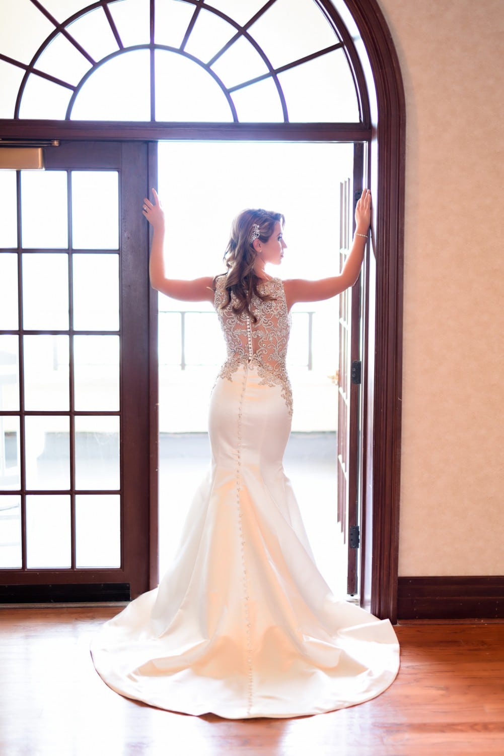 Bride standing in the doorway at the Ocean Club - Grande Dunes Ocean Club - Myrtle Beach