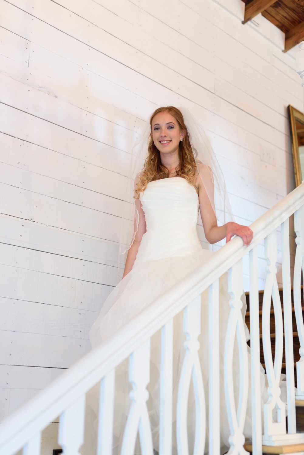Bride walking down cottage stairs - Wildberry Farm