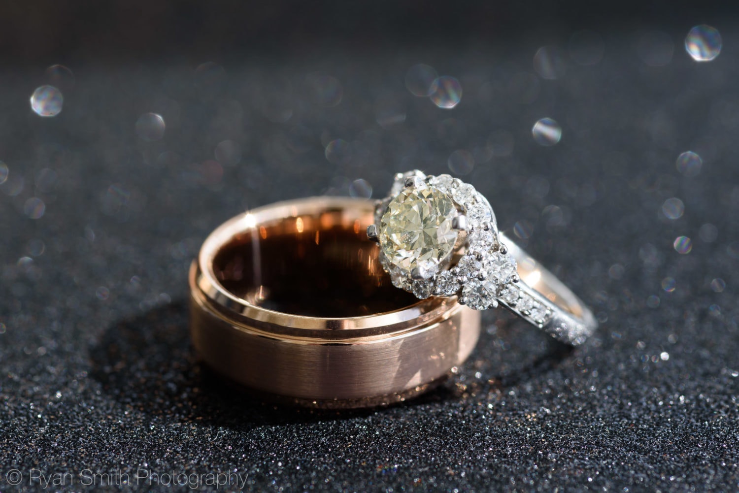 Closeup of bride's engagement ring and grooms wedding band - Pawleys Island
