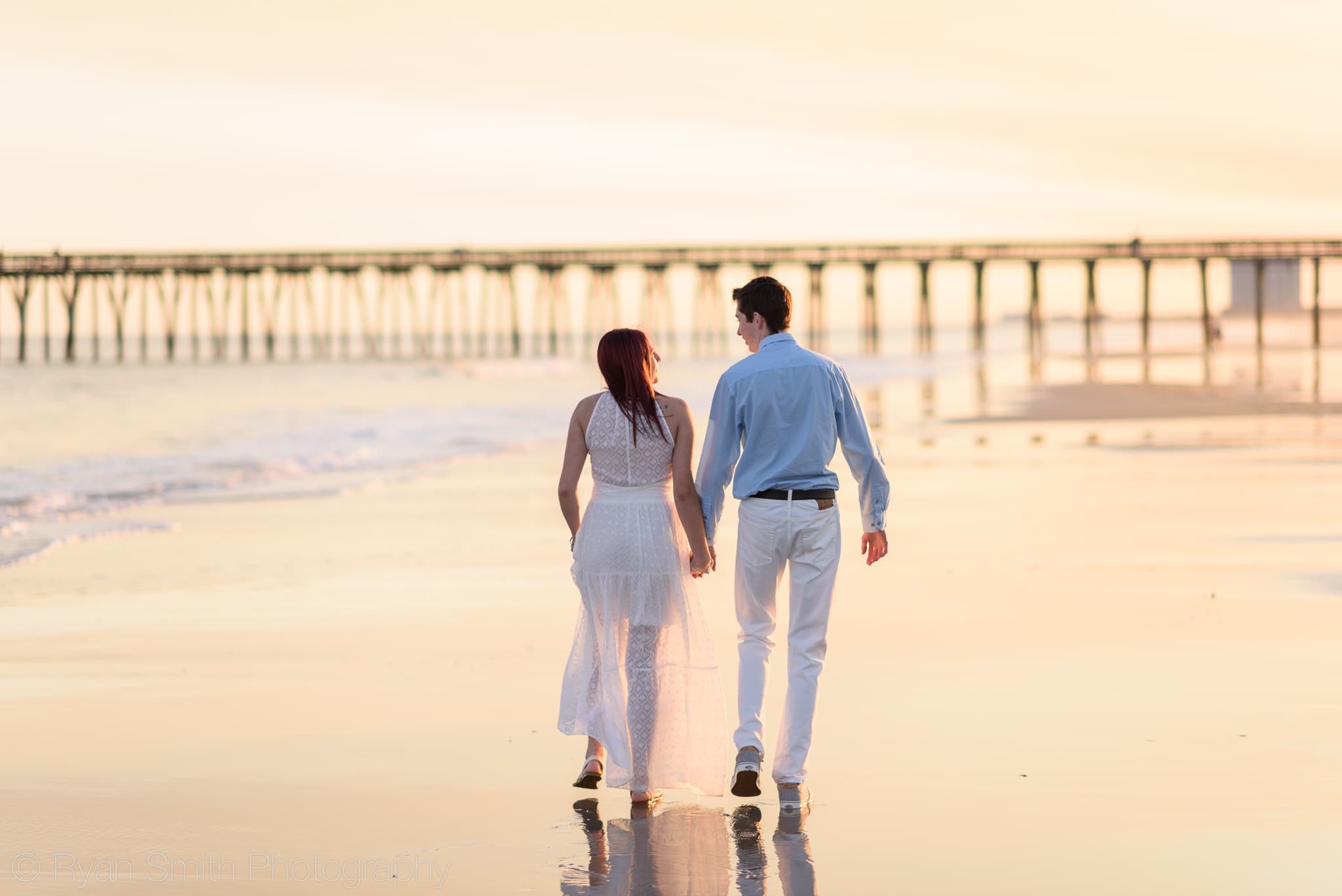 Couple walking by the ocean before proposal - Myrtle Beach State Park