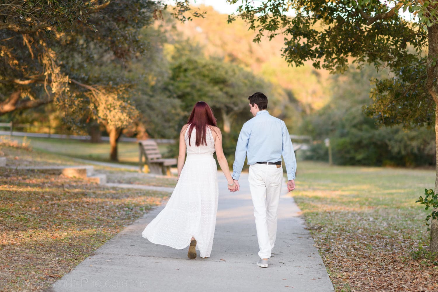 Couple walking down pathway  - Myrtle Beach State Park