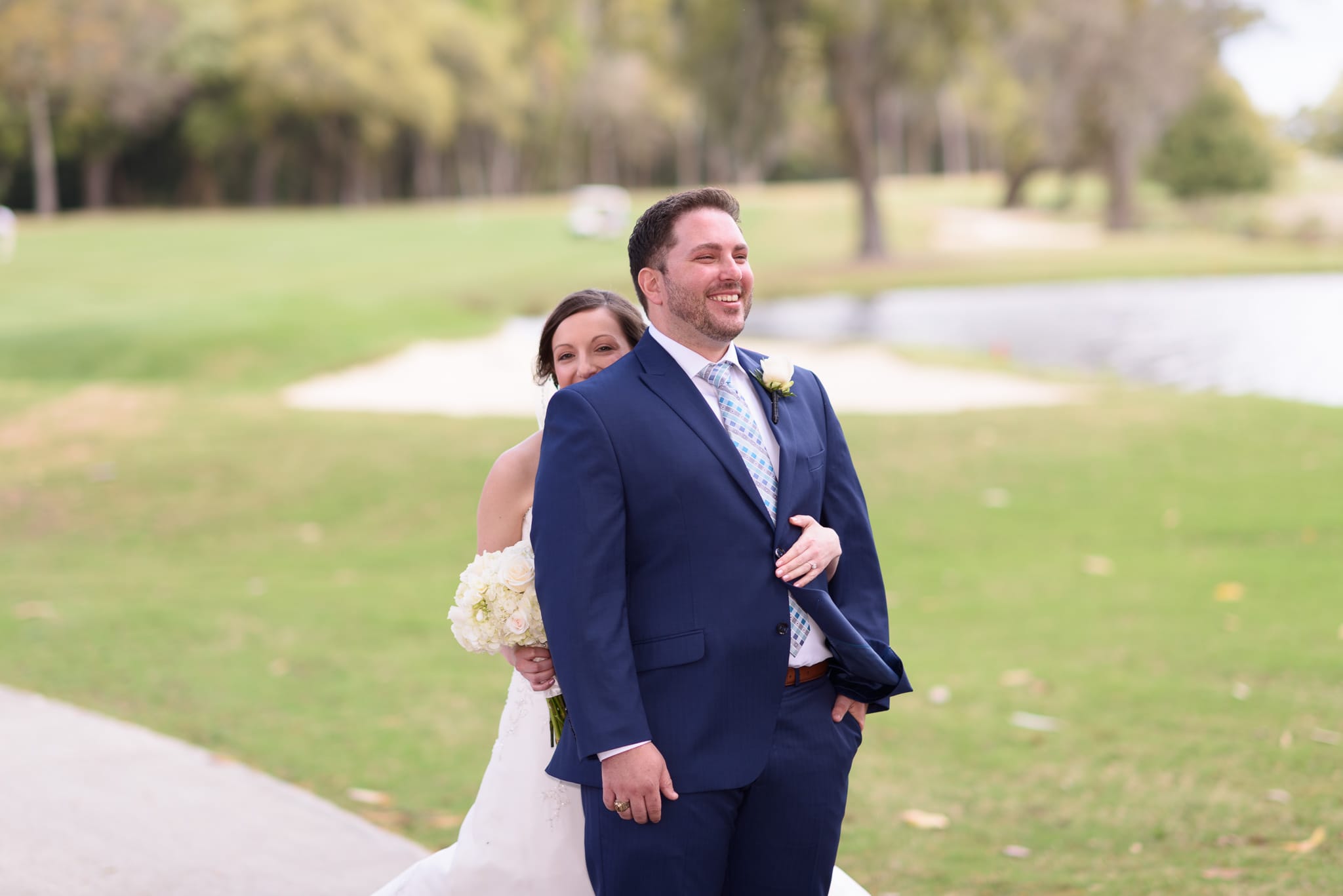 First look with bride and groom on golfcourse - Pawleys Plantation