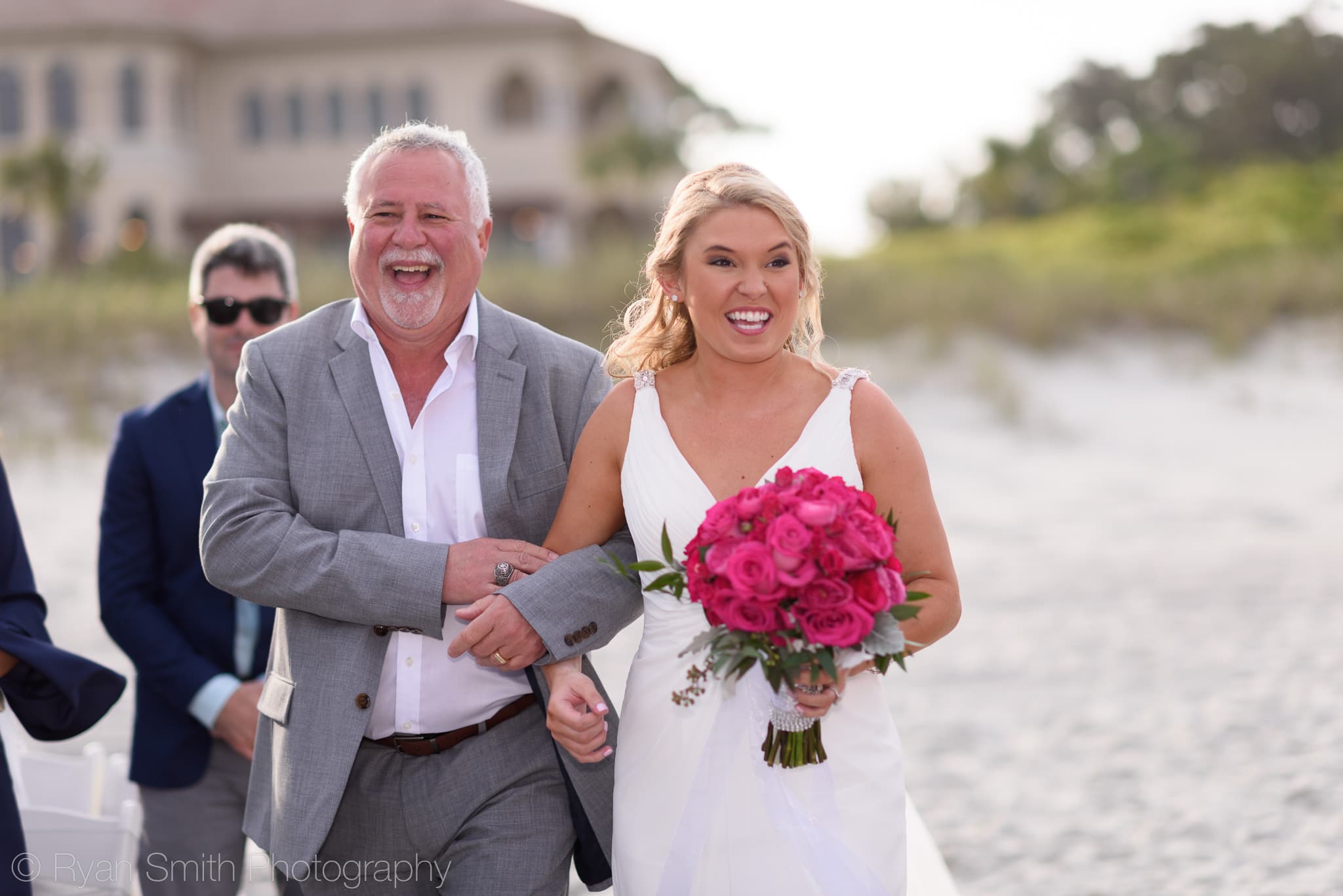 Happy bride walking with father - Grande Dunes Ocean Club