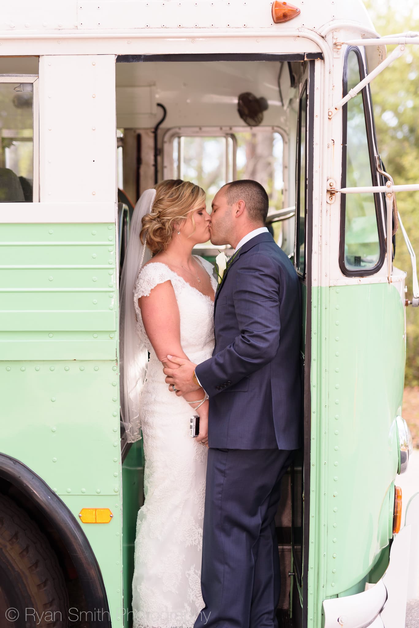 Kiss on the classic bus leaving for the ceremony - Pawleys Plantation