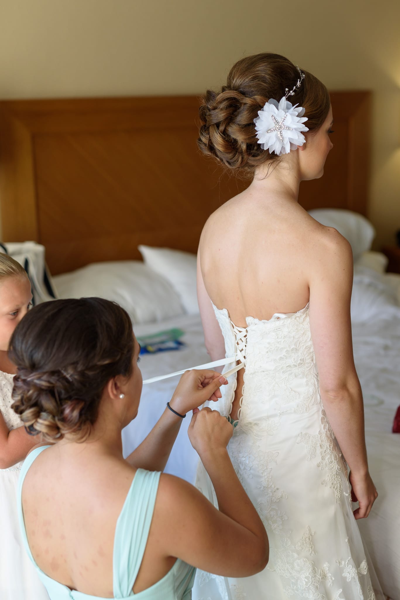 Lacing up bride's dress - Hilton at Kingston Plantation