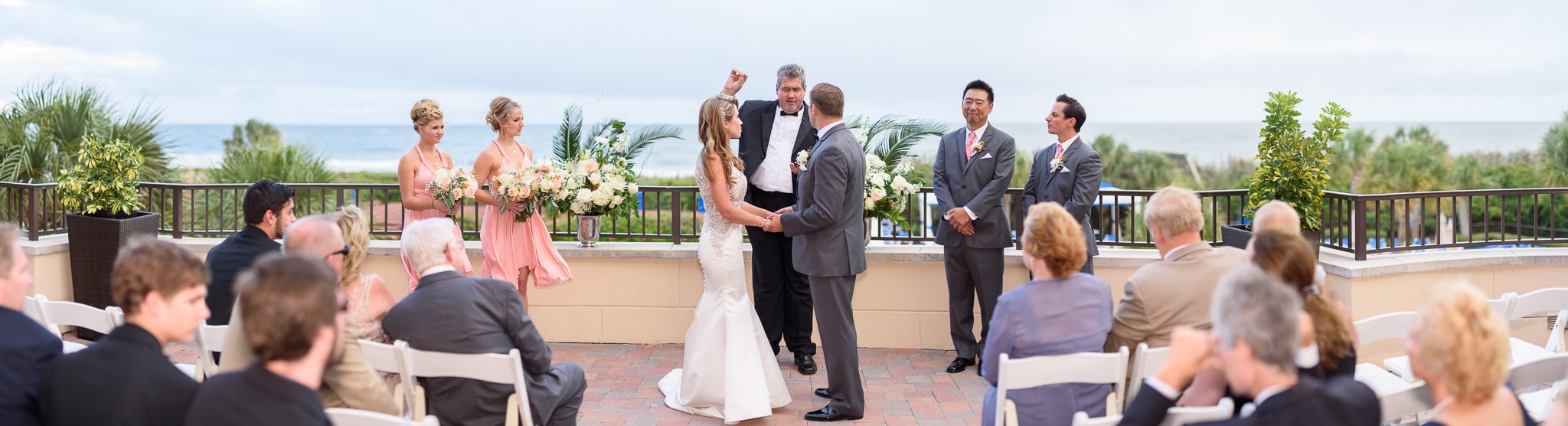 Panorama of wedding ceremony on veranda overlooking the ocean - Grande Dunes Ocean Club - Myrtle Beach