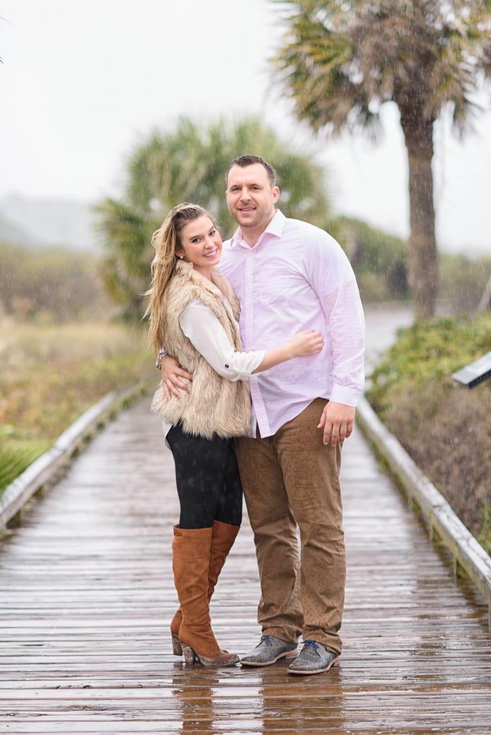 Pouring rain during engagement pictures -