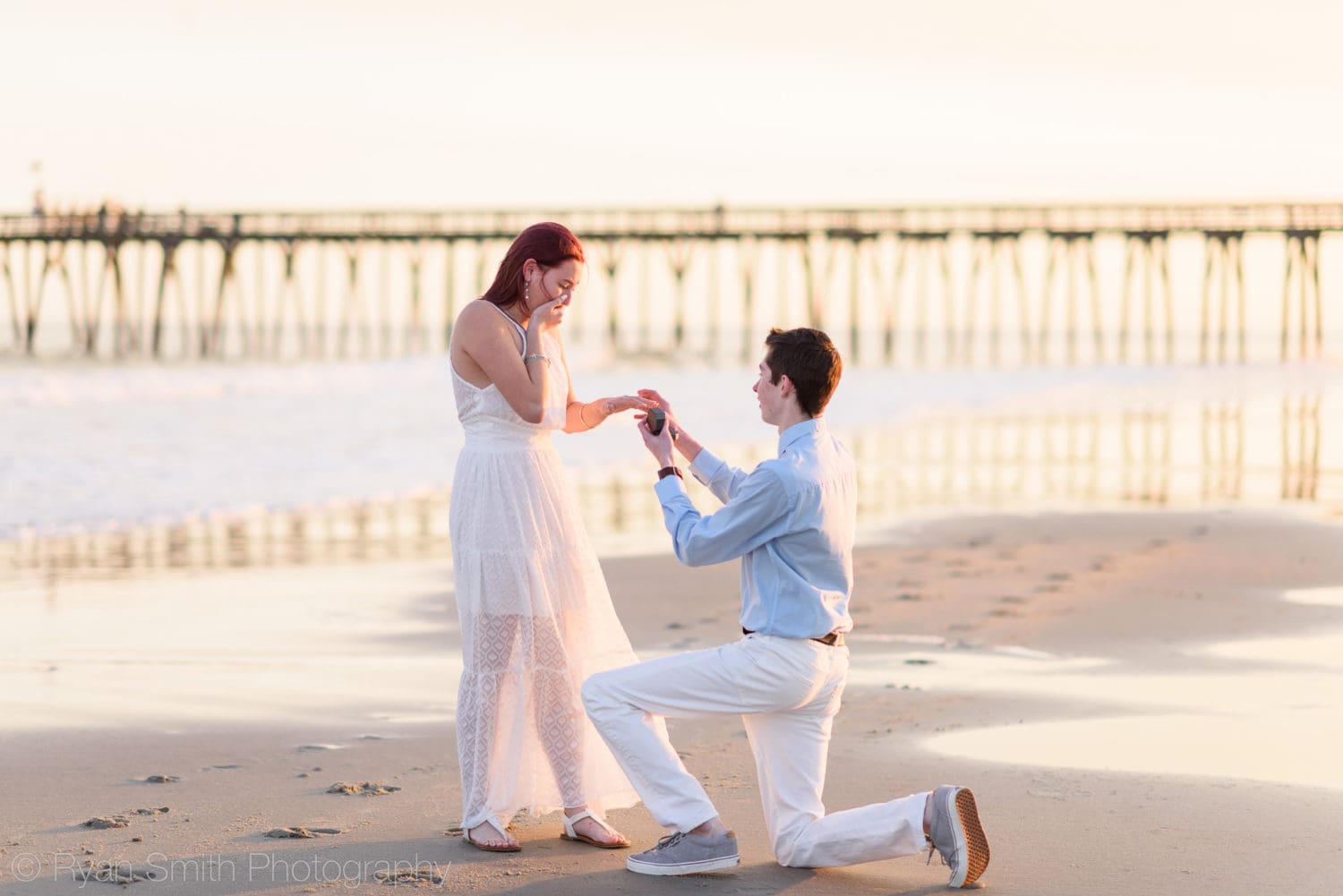 Putting on the ring after surprise marriage proposal - Myrtle Beach State Park