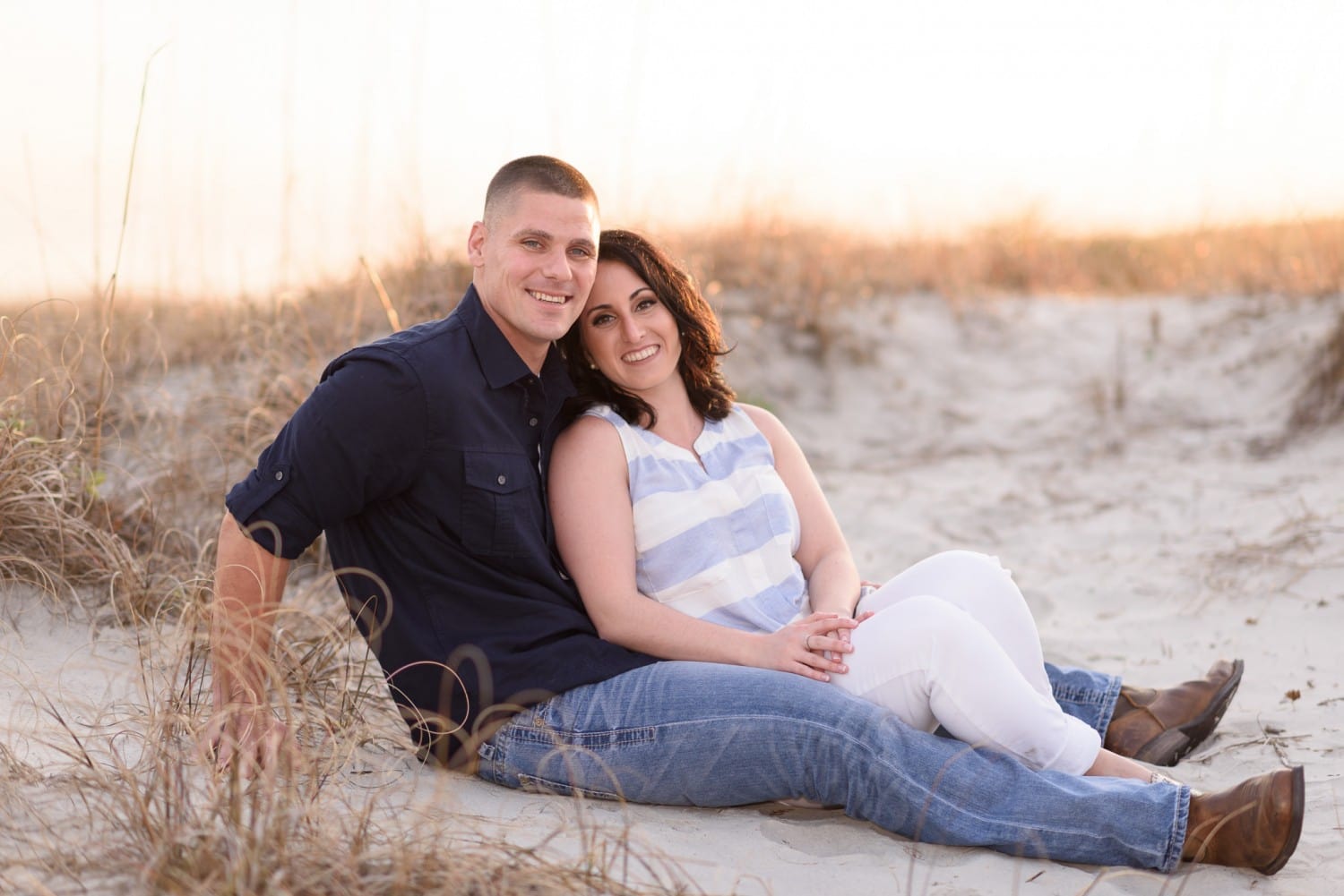 Romantic engagement portraits in front of the sea oats - Huntington State Park