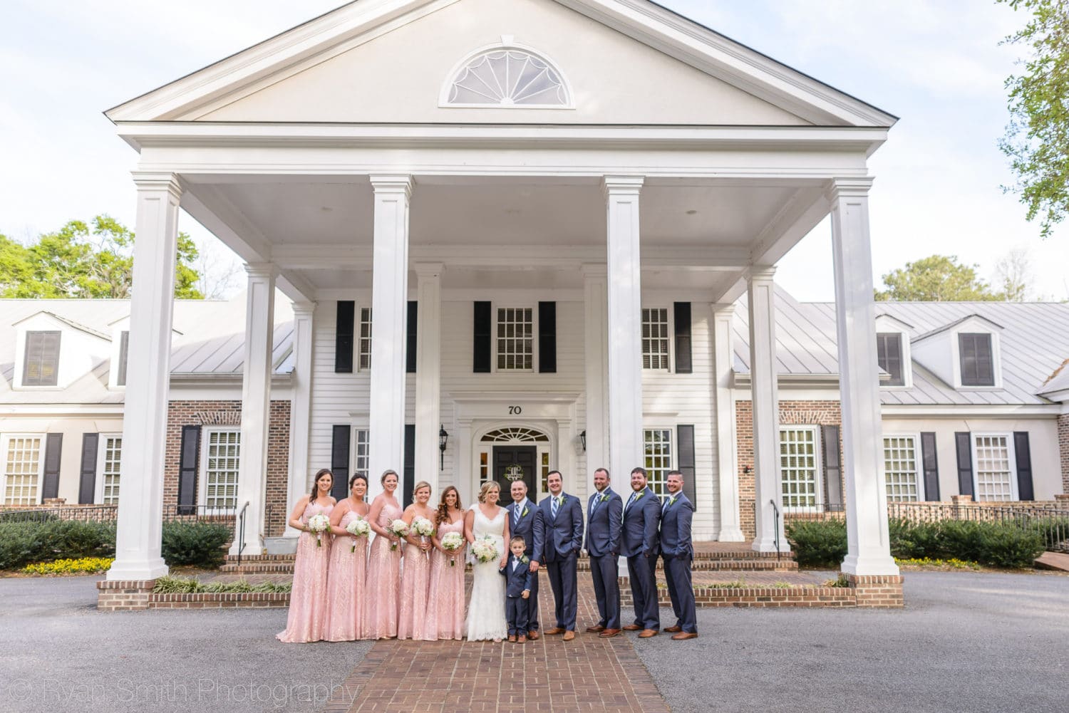 Wide angle of bridal party in front of the clubhouse - Pawleys Plantation