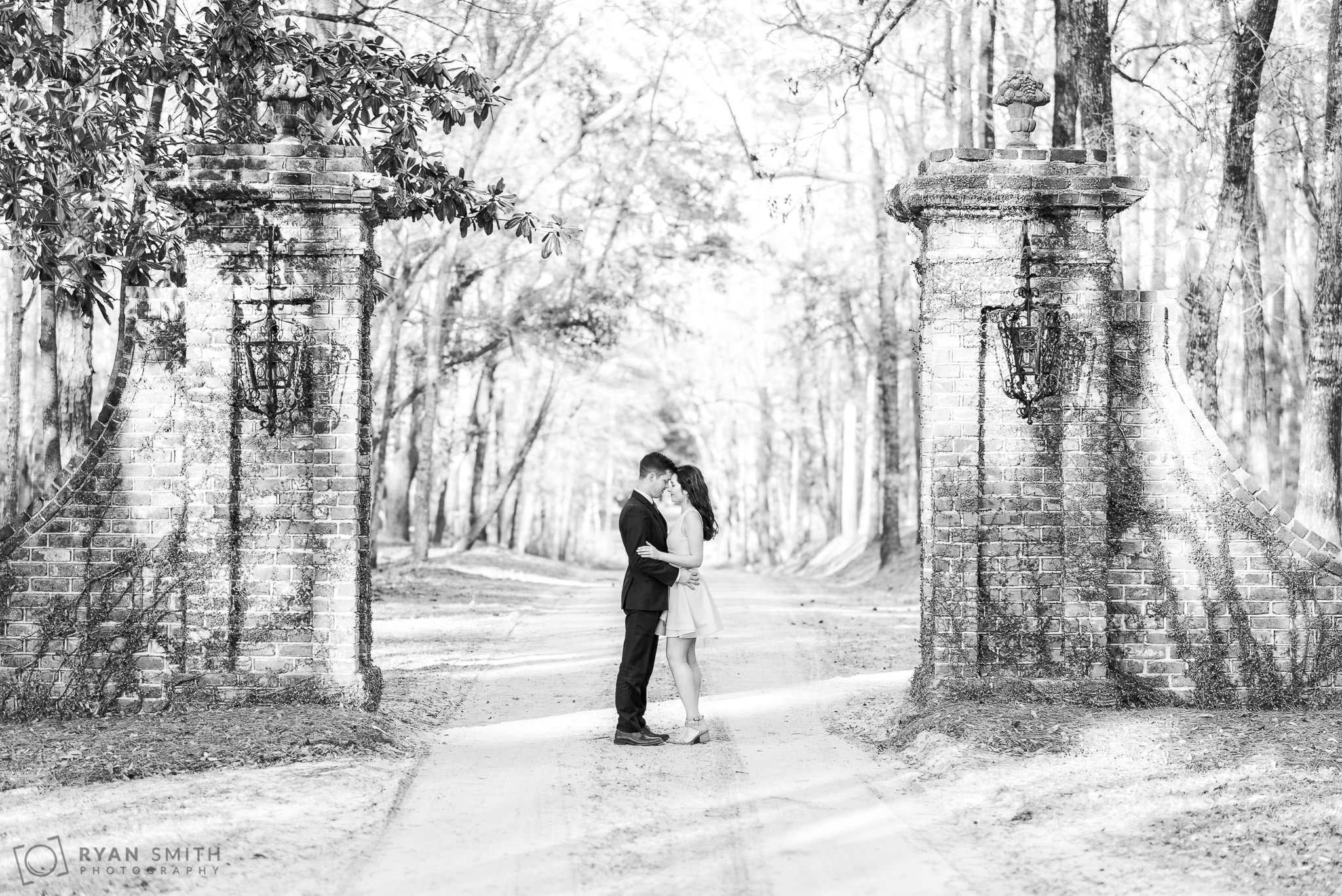 Black and white portrait by the entrance gates Mansfield Plantation, Georgetown