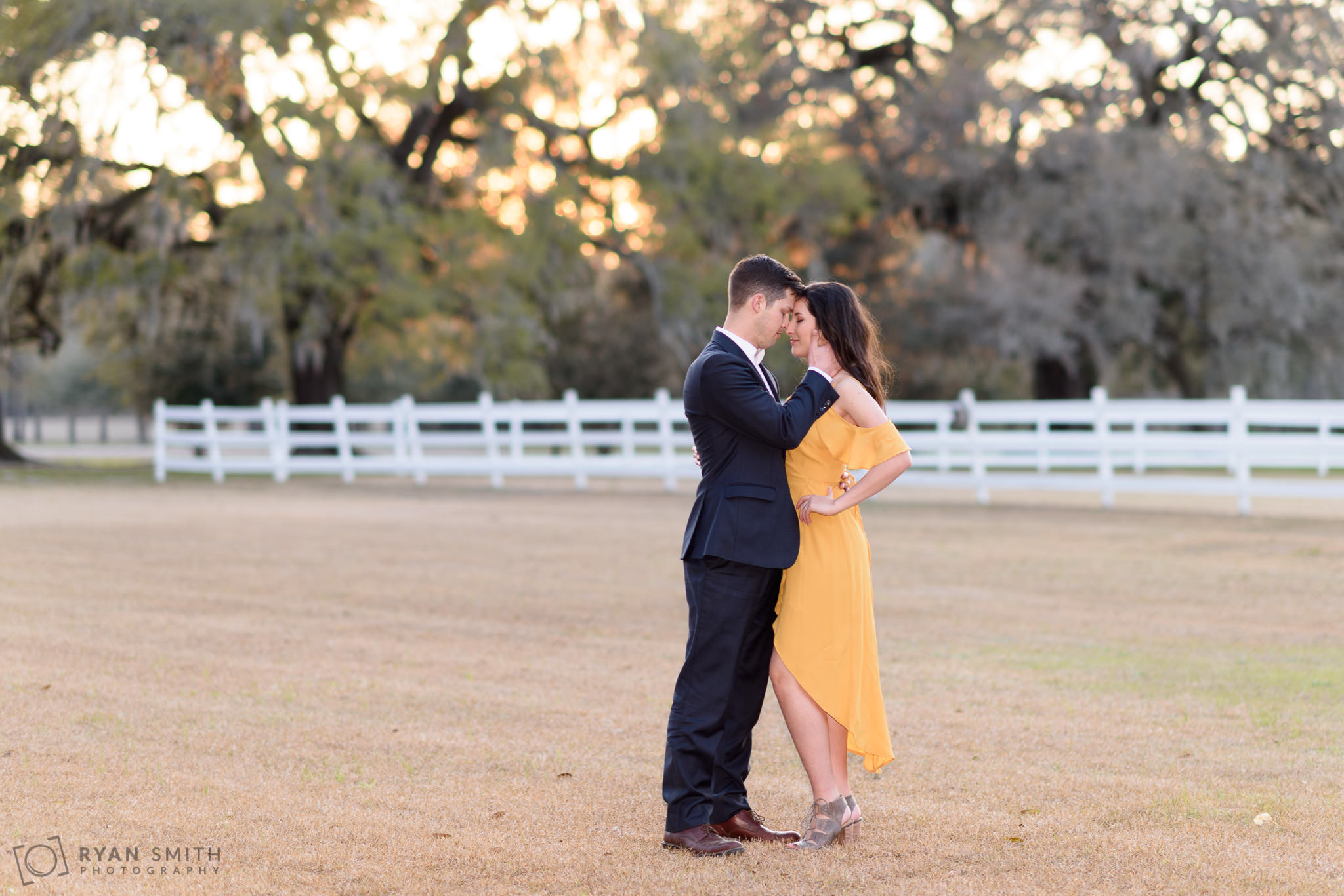 Romantic pose in front of the white fence  Mansfield Plantation, Georgetown