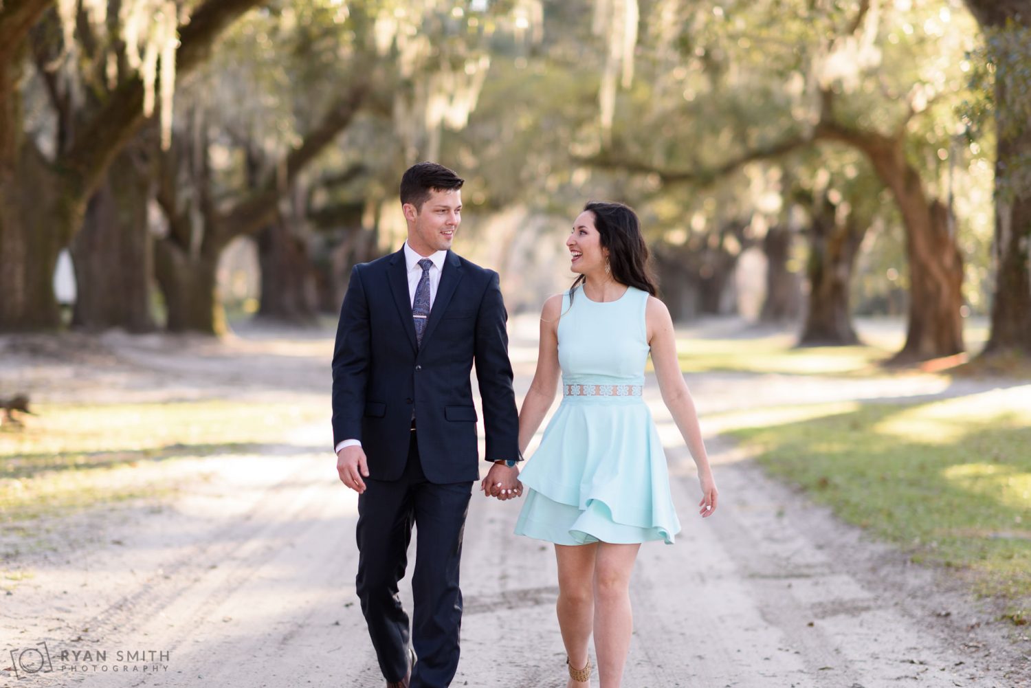 Walking down the roadway holding hands Mansfield Plantation, Georgetown