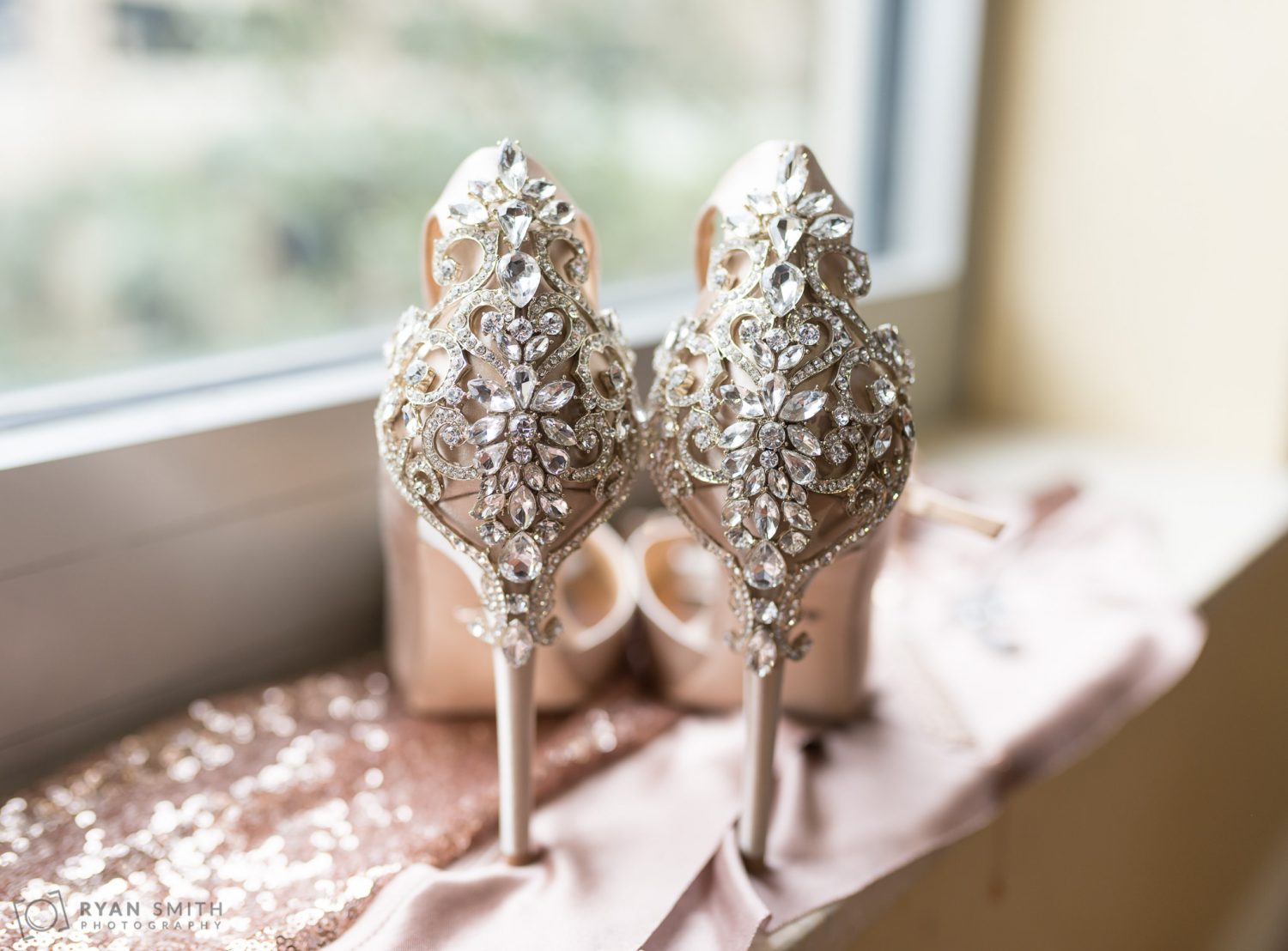 Jeweled bride's shoes sitting in the window Hilton Myrtle Beach Resort