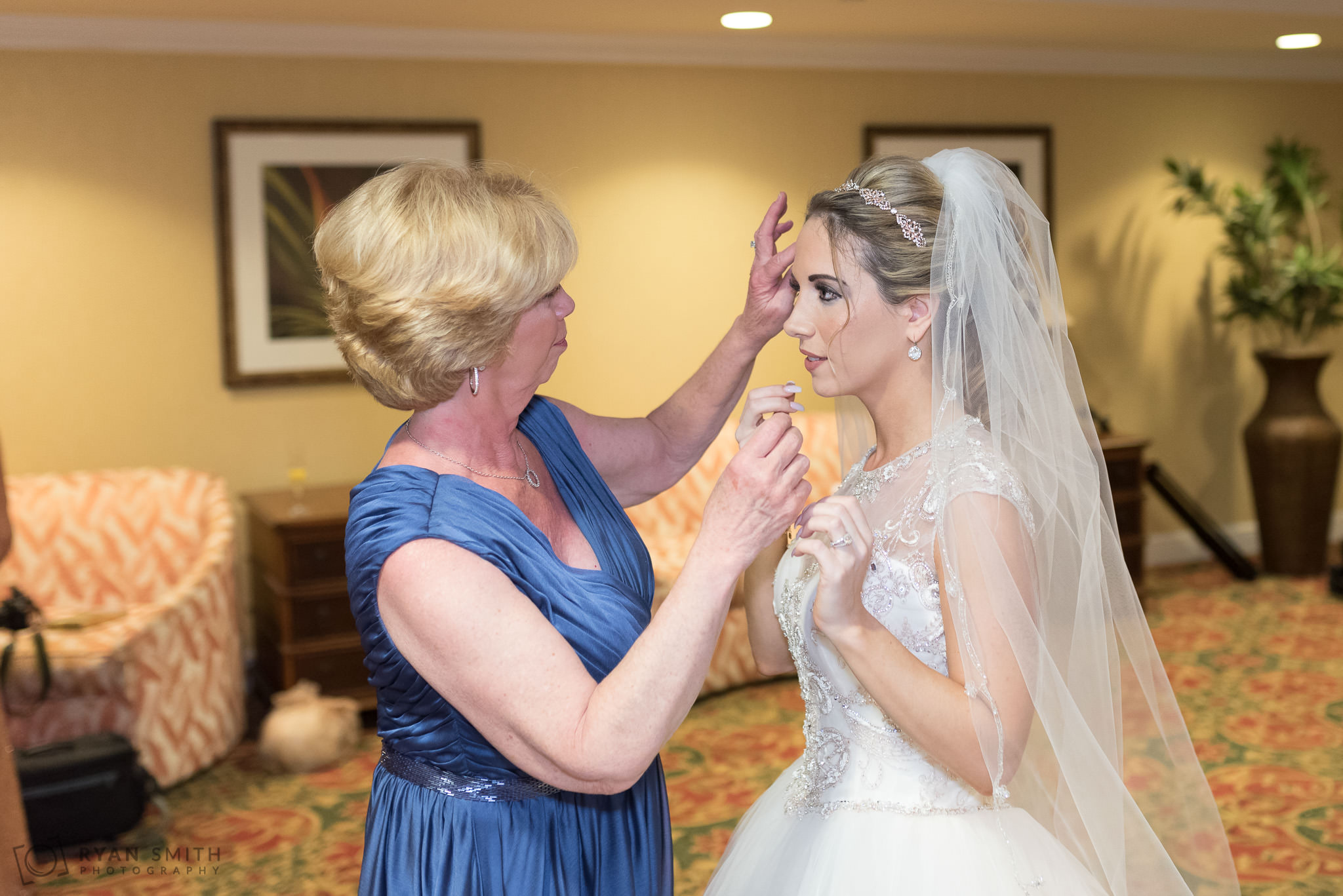 Mom checking bride's hair Hilton Myrtle Beach Resort