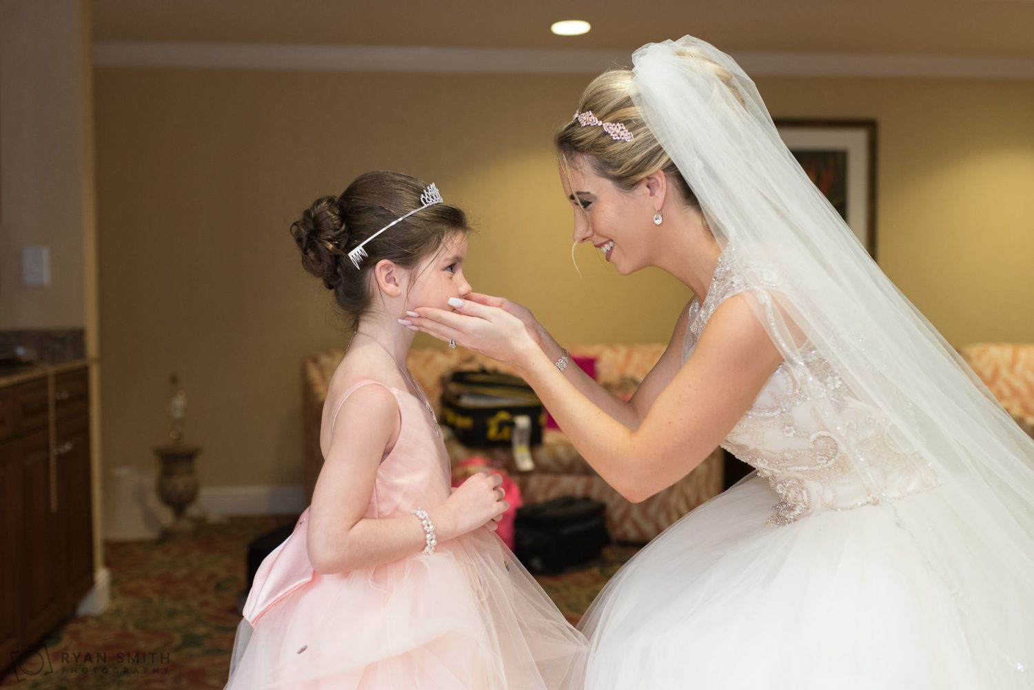Bride looking at flower girl before ceremony Hilton Myrtle Beach Resort