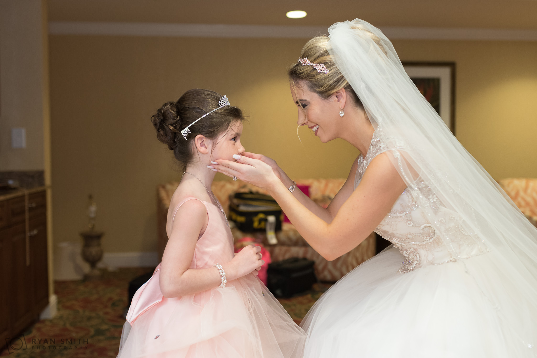 Bride looking at flower girl before ceremony Hilton Myrtle Beach Resort